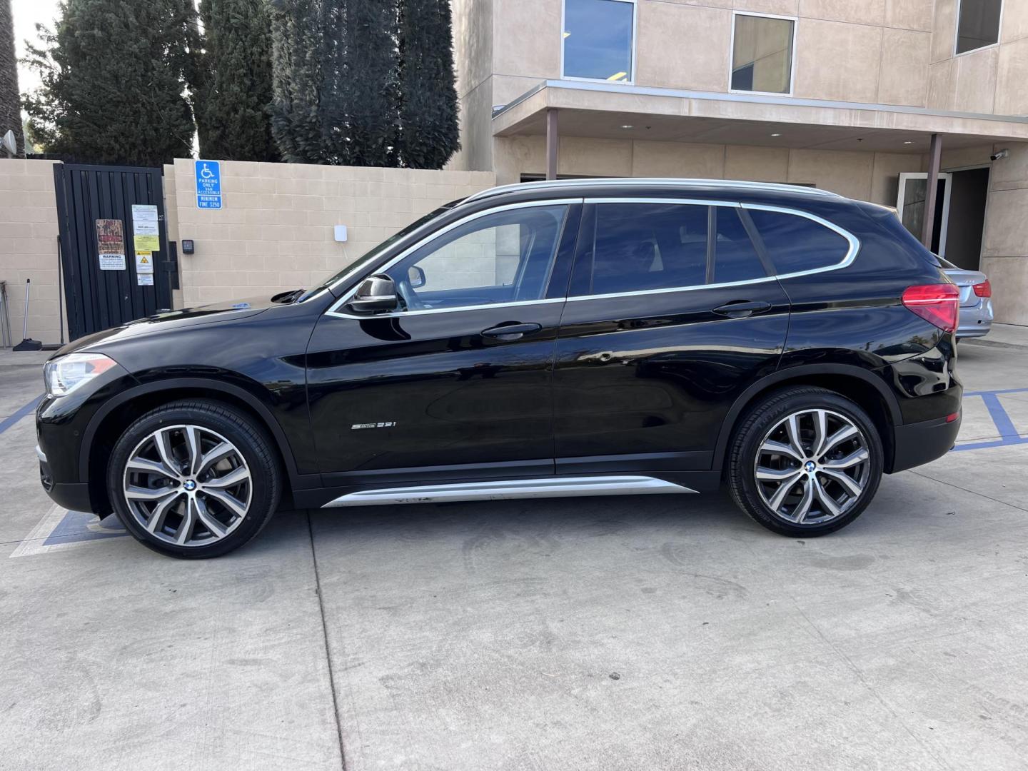 2017 Black /Black BMW X1 sDrive28i (WBXHU7C33H5) with an 2.0L L4 DOHC 16V engine, 8A transmission, located at 30 S. Berkeley Avenue, Pasadena, CA, 91107, (626) 248-7567, 34.145447, -118.109398 - Experience the pinnacle of luxury and versatility with the 2017 BMW X1, a compact SUV that delivers style, performance, and cutting-edge technology in one stunning package. With low miles for its year at just 79,804, this exceptional vehicle offers you an incredible opportunity to drive a nearly new - Photo#1