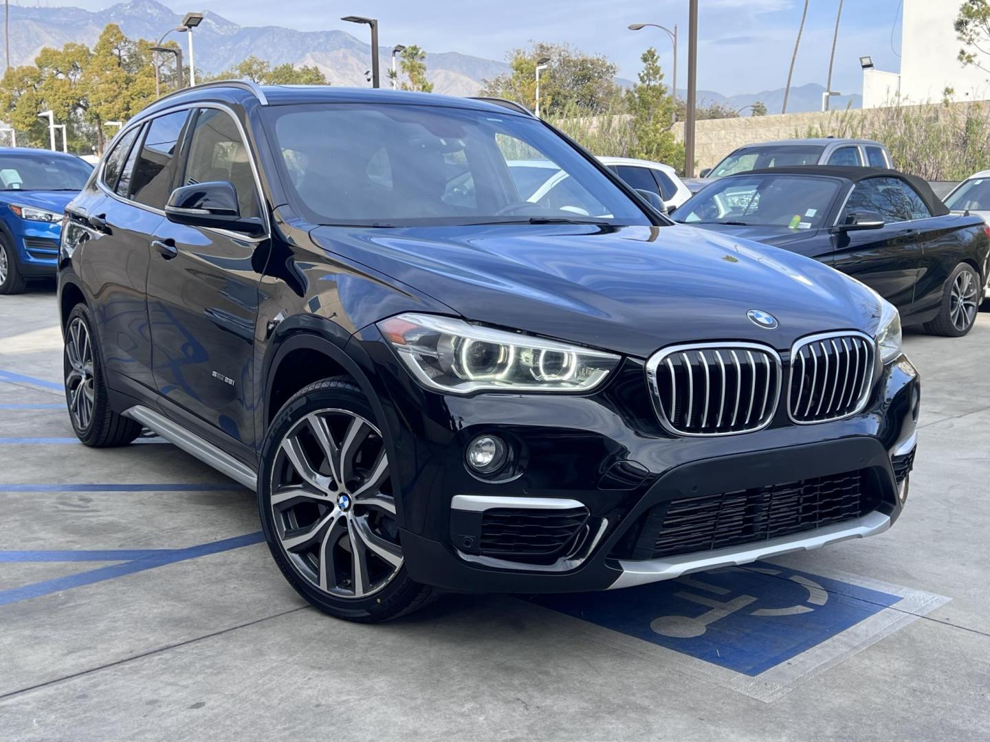 2017 Black /Black BMW X1 sDrive28i (WBXHU7C33H5) with an 2.0L L4 DOHC 16V engine, 8A transmission, located at 30 S. Berkeley Avenue, Pasadena, CA, 91107, (626) 248-7567, 34.145447, -118.109398 - Experience the pinnacle of luxury and versatility with the 2017 BMW X1, a compact SUV that delivers style, performance, and cutting-edge technology in one stunning package. With low miles for its year at just 79,804, this exceptional vehicle offers you an incredible opportunity to drive a nearly new - Photo#4