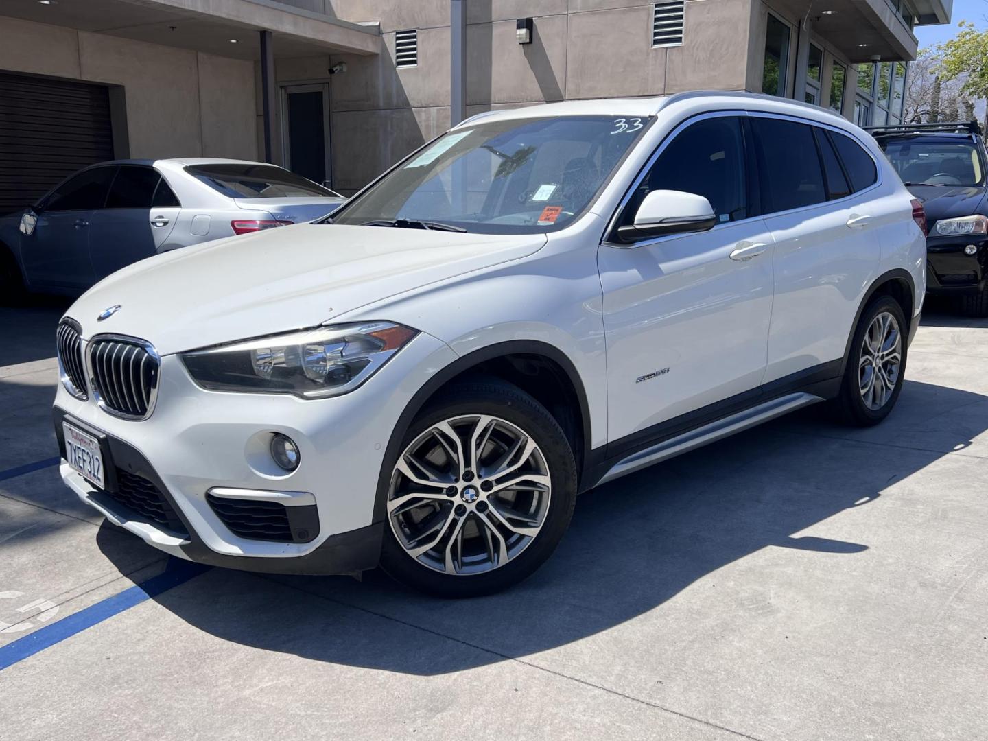 2017 Alpine White /Black BMW X1 sDrive28i (WBXHU7C38HP) with an 2.0L L4 DOHC 16V engine, 8A transmission, located at 30 S. Berkeley Avenue, Pasadena, CA, 91107, (626) 248-7567, 34.145447, -118.109398 - 2017 BMW X1 xDrive28i – Luxury AWD SUV – Buy Here Pay Here – $995 Down – Bad Credit OK – Crown City Motors – Pasadena, CA Looking for a luxury SUV that’s compact, powerful, and packed with high-end features—all without breaking the bank? Check out this 2017 BMW X1 xDrive28i, now a - Photo#0