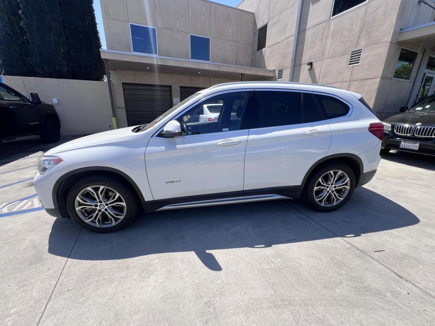 2017 Alpine White /Black BMW X1 sDrive28i (WBXHU7C38HP) with an 2.0L L4 DOHC 16V engine, 8A transmission, located at 30 S. Berkeley Avenue, Pasadena, CA, 91107, (626) 248-7567, 34.145447, -118.109398 - 2017 BMW X1 xDrive28i – Luxury AWD SUV – Buy Here Pay Here – $995 Down – Bad Credit OK – Crown City Motors – Pasadena, CA Looking for a luxury SUV that’s compact, powerful, and packed with high-end features—all without breaking the bank? Check out this 2017 BMW X1 xDrive28i, now a - Photo#1