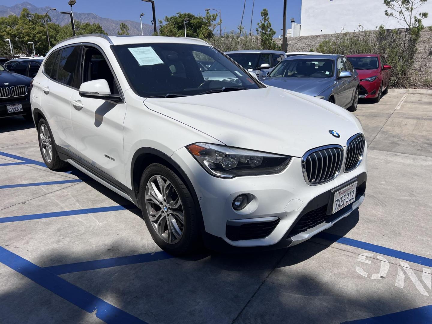 2017 Alpine White /Black BMW X1 sDrive28i (WBXHU7C38HP) with an 2.0L L4 DOHC 16V engine, 8A transmission, located at 30 S. Berkeley Avenue, Pasadena, CA, 91107, (626) 248-7567, 34.145447, -118.109398 - 2017 BMW X1 xDrive28i – Luxury AWD SUV – Buy Here Pay Here – $995 Down – Bad Credit OK – Crown City Motors – Pasadena, CA Looking for a luxury SUV that’s compact, powerful, and packed with high-end features—all without breaking the bank? Check out this 2017 BMW X1 xDrive28i, now a - Photo#4