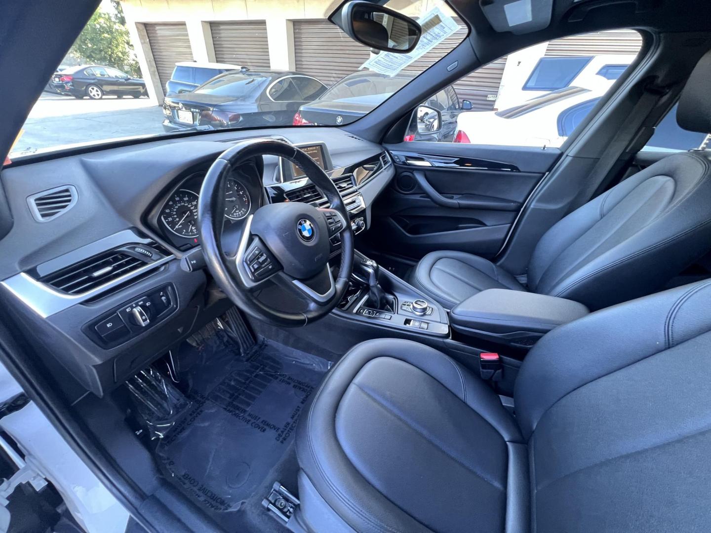2017 Alpine White /Black BMW X1 sDrive28i (WBXHU7C38HP) with an 2.0L L4 DOHC 16V engine, 8A transmission, located at 30 S. Berkeley Avenue, Pasadena, CA, 91107, (626) 248-7567, 34.145447, -118.109398 - 2017 BMW X1 xDrive28i – Luxury AWD SUV – Buy Here Pay Here – $995 Down – Bad Credit OK – Crown City Motors – Pasadena, CA Looking for a luxury SUV that’s compact, powerful, and packed with high-end features—all without breaking the bank? Check out this 2017 BMW X1 xDrive28i, now a - Photo#16