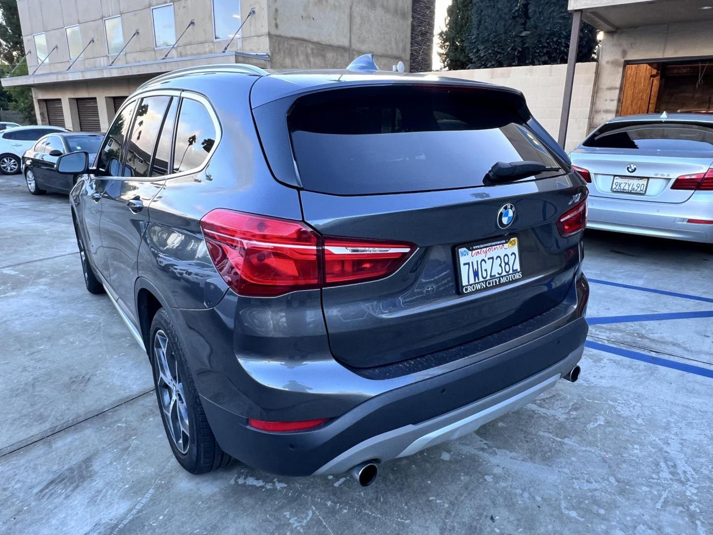 2017 BMW X1 sDrive28i (WBXHU7C36HP) with an 2.0L L4 DOHC 16V engine, 8A transmission, located at 30 S. Berkeley Avenue, Pasadena, CA, 91107, (626) 248-7567, 34.145447, -118.109398 - Photo#2