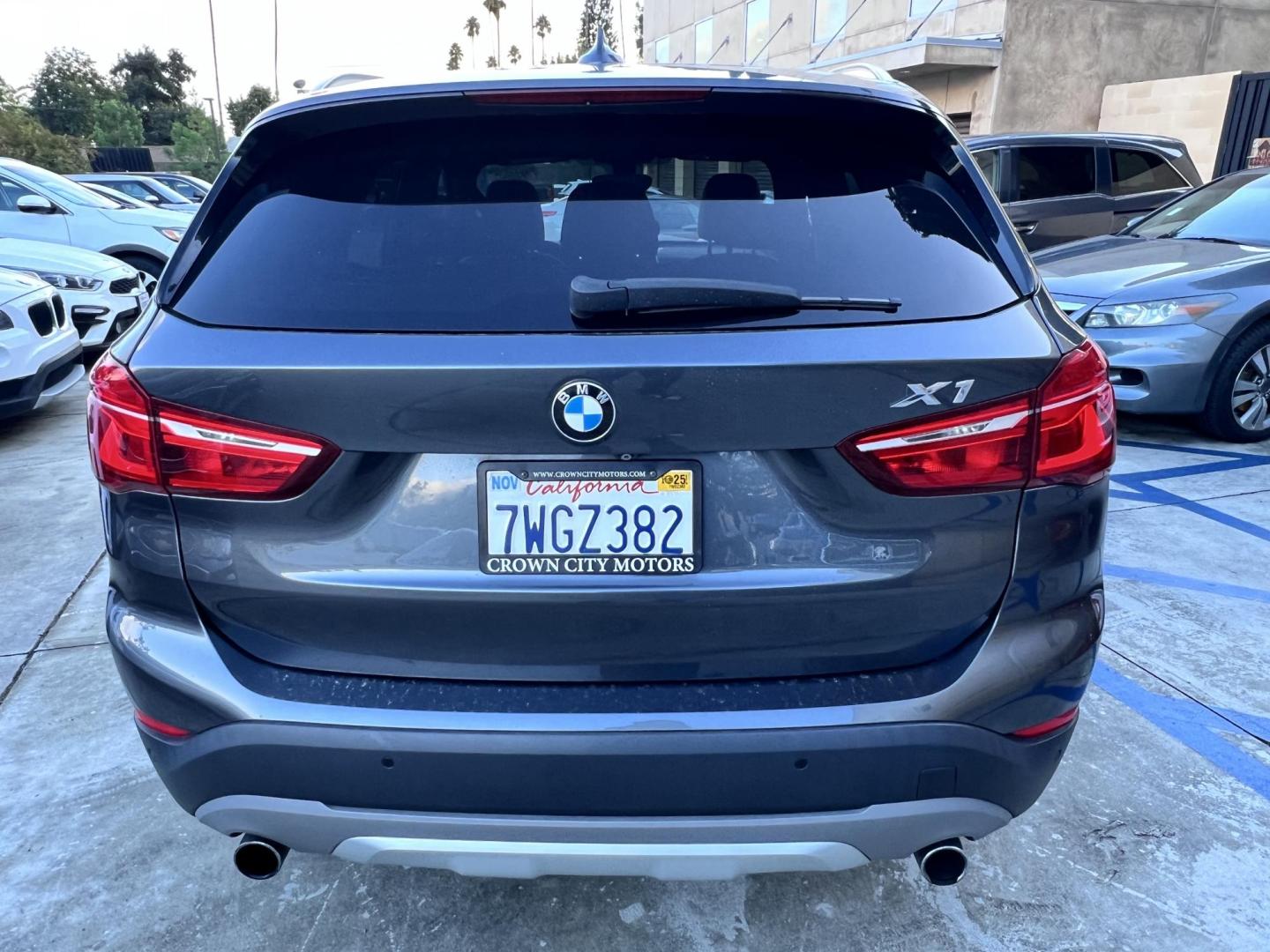 2017 BMW X1 sDrive28i (WBXHU7C36HP) with an 2.0L L4 DOHC 16V engine, 8A transmission, located at 30 S. Berkeley Avenue, Pasadena, CA, 91107, (626) 248-7567, 34.145447, -118.109398 - Photo#3