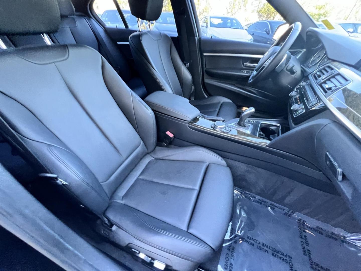 2017 BMW X1 sDrive28i (WBXHU7C36HP) with an 2.0L L4 DOHC 16V engine, 8A transmission, located at 30 S. Berkeley Avenue, Pasadena, CA, 91107, (626) 248-7567, 34.145447, -118.109398 - Photo#12