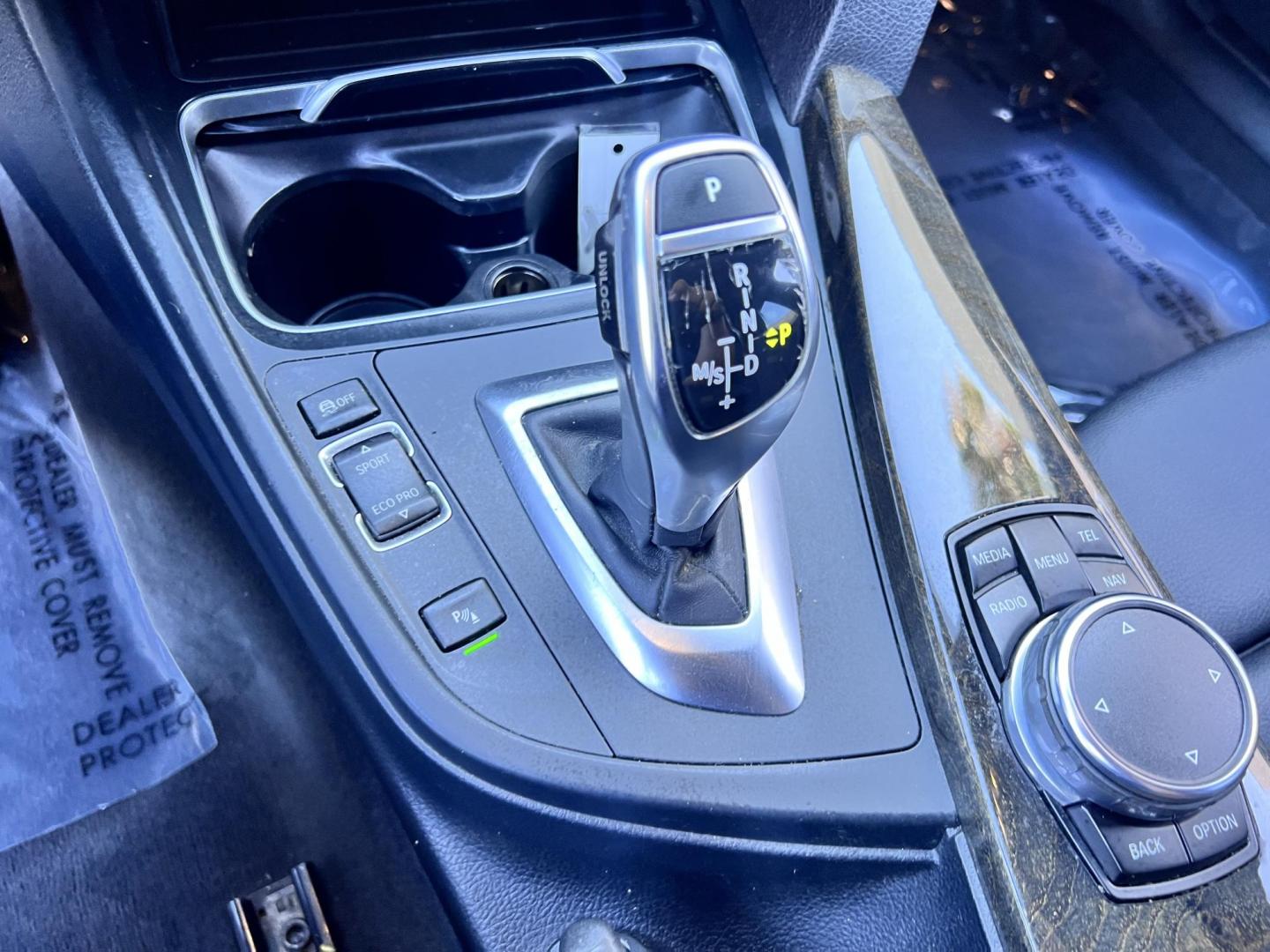 2017 BMW X1 sDrive28i (WBXHU7C36HP) with an 2.0L L4 DOHC 16V engine, 8A transmission, located at 30 S. Berkeley Avenue, Pasadena, CA, 91107, (626) 248-7567, 34.145447, -118.109398 - Photo#14