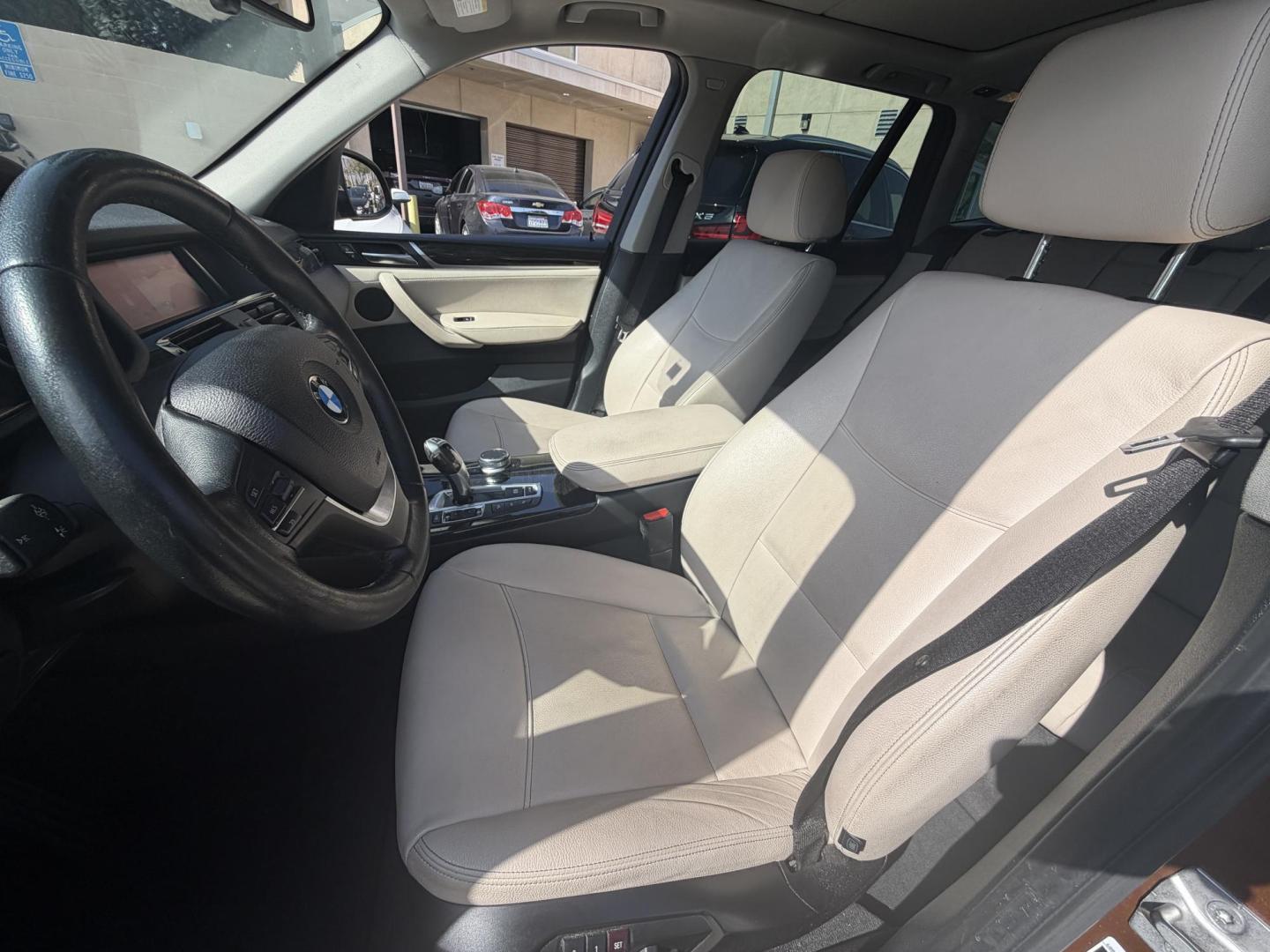 2017 Barcelona Red Metallic BMW X3 xDrive28i (5UXWX9C56H0) with an 2.0L L4 DOHC 16V engine, 8A transmission, located at 30 S. Berkeley Avenue, Pasadena, CA, 91107, (626) 248-7567, 34.145447, -118.109398 - Crown City Motors is a used “Buy Here Pay Here” car dealer in Pasadena CA. “Buy Here Pay Here” financing, means that when you purchase your vehicle from our dealership, that you make the payments to the dealership as well. We do not need the banks approval to get you approved for a used auto - Photo#7