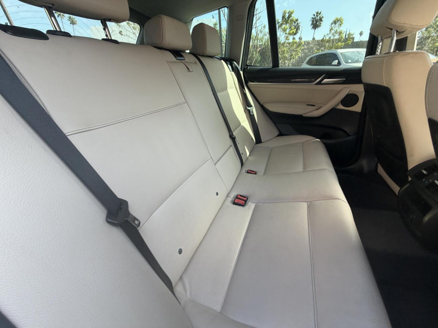 2017 Barcelona Red Metallic BMW X3 xDrive28i (5UXWX9C56H0) with an 2.0L L4 DOHC 16V engine, 8A transmission, located at 30 S. Berkeley Avenue, Pasadena, CA, 91107, (626) 248-7567, 34.145447, -118.109398 - Crown City Motors is a used “Buy Here Pay Here” car dealer in Pasadena CA. “Buy Here Pay Here” financing, means that when you purchase your vehicle from our dealership, that you make the payments to the dealership as well. We do not need the banks approval to get you approved for a used auto - Photo#12