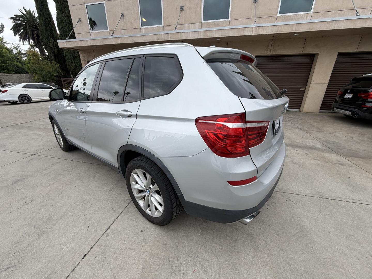 2017 Urban Titanium Metallic: /Black BMW X3 xDrive28i (5UXWX9C33H0) with an 2.0L L4 DOHC 16V engine, 8A transmission, located at 30 S. Berkeley Avenue, Pasadena, CA, 91107, (626) 248-7567, 34.145447, -118.109398 - rive a 2017 BMW X3 Today – Luxury SUV with Easy Financing at Crown City Motors If you’re looking for a luxury SUV that delivers performance, comfort, and everyday practicality, this 2017 BMW X3 is the perfect fit. Known for its smooth ride, premium interior, and strong performance, the BMW X3 - Photo#2