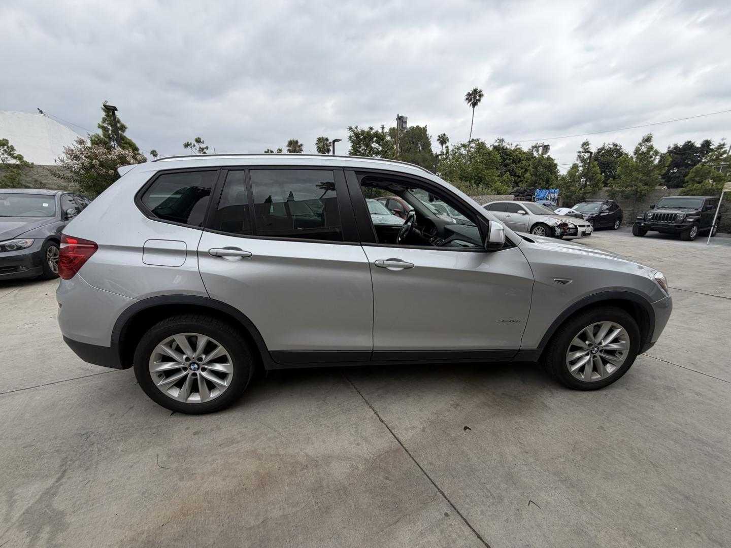 2017 Urban Titanium Metallic: /Black BMW X3 xDrive28i (5UXWX9C33H0) with an 2.0L L4 DOHC 16V engine, 8A transmission, located at 30 S. Berkeley Avenue, Pasadena, CA, 91107, (626) 248-7567, 34.145447, -118.109398 - rive a 2017 BMW X3 Today – Luxury SUV with Easy Financing at Crown City Motors If you’re looking for a luxury SUV that delivers performance, comfort, and everyday practicality, this 2017 BMW X3 is the perfect fit. Known for its smooth ride, premium interior, and strong performance, the BMW X3 - Photo#5