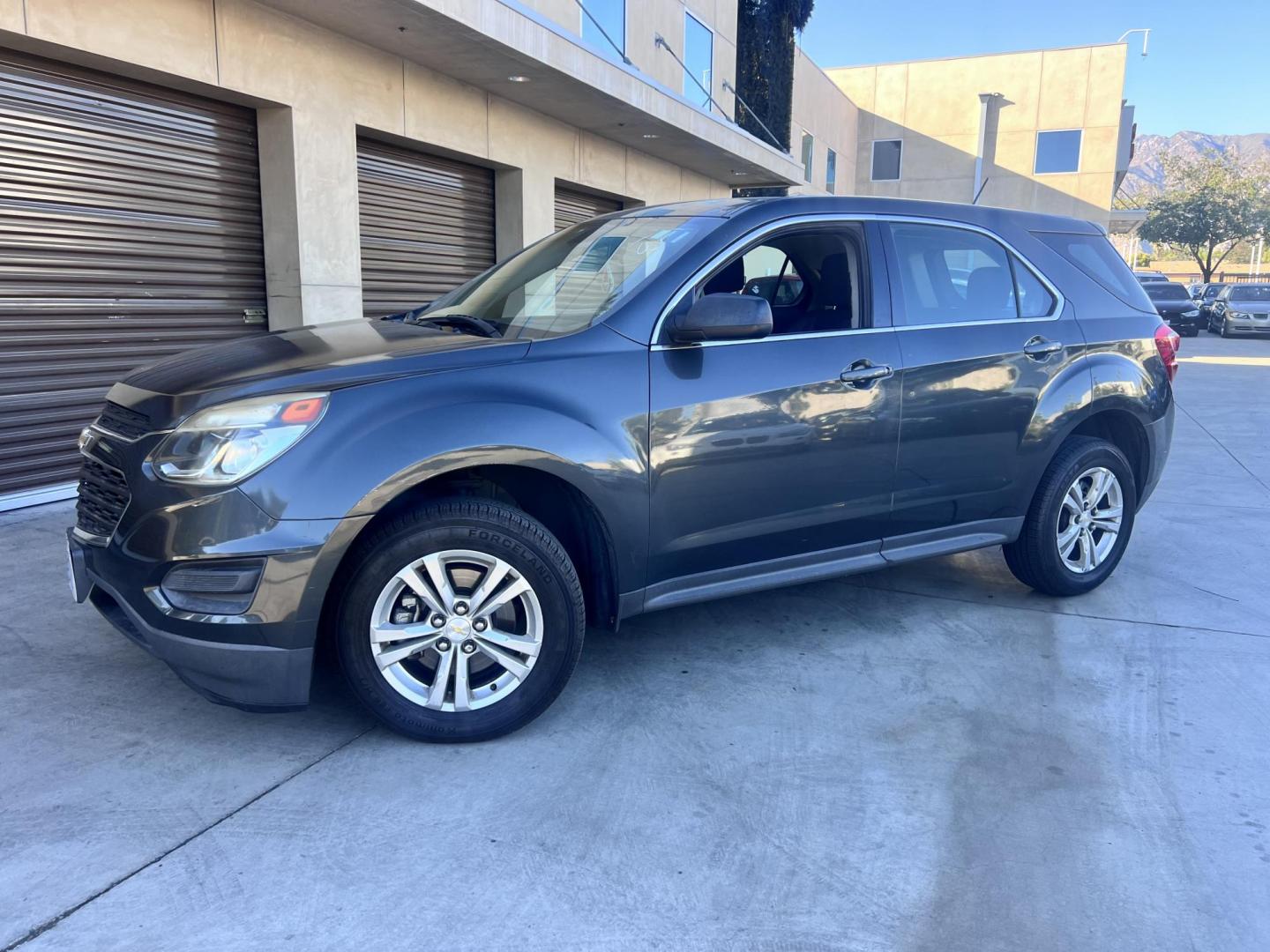 2017 Gray /Black Chevrolet Equinox LS 2WD (2GNALBEK9H1) with an 2.4L L4 DOHC 16V FFV engine, 6A transmission, located at 30 S. Berkeley Avenue, Pasadena, CA, 91107, (626) 248-7567, 34.145447, -118.109398 - 2017 Chevrolet Equinox LS – Fuel-Efficient SUV – Buy Here Pay Here – $995 Down – Bad Credit OK – Crown City Motors – Pasadena, CA Need a dependable SUV with room for the family, great fuel economy, and affordable payments? This 2017 Chevrolet Equinox LS is the perfect compact SUV for - Photo#0