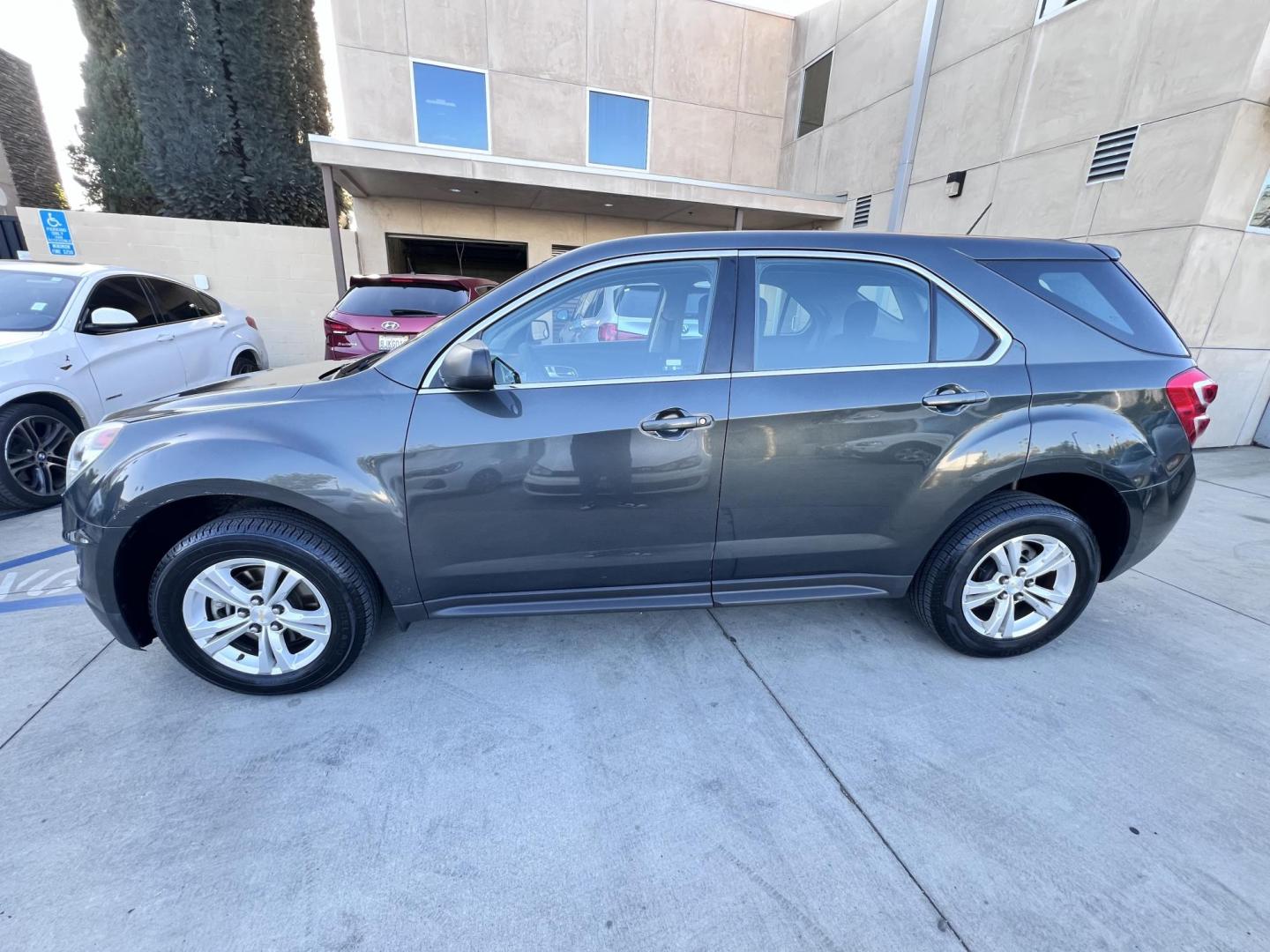 2017 Gray /Black Chevrolet Equinox LS 2WD (2GNALBEK9H1) with an 2.4L L4 DOHC 16V FFV engine, 6A transmission, located at 30 S. Berkeley Avenue, Pasadena, CA, 91107, (626) 248-7567, 34.145447, -118.109398 - 2017 Chevrolet Equinox LS – Fuel-Efficient SUV – Buy Here Pay Here – $995 Down – Bad Credit OK – Crown City Motors – Pasadena, CA Need a dependable SUV with room for the family, great fuel economy, and affordable payments? This 2017 Chevrolet Equinox LS is the perfect compact SUV for- Photo#6