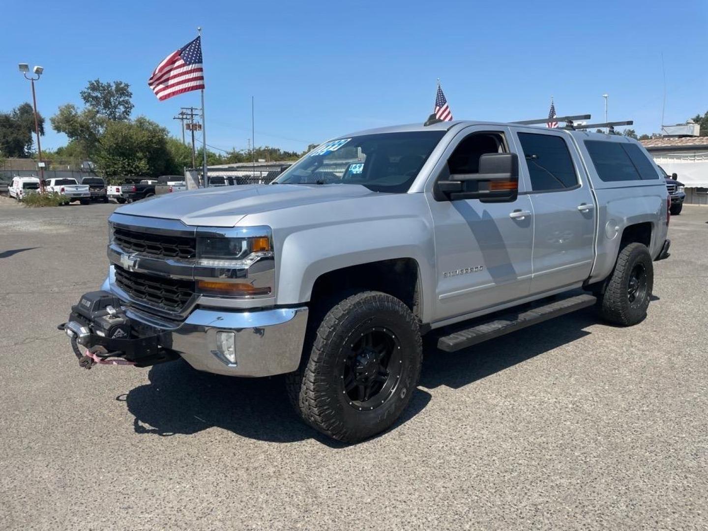 2017 Silver Ice Metallic Chevrolet Silverado 1500 LT (3GCUKREC0HG) with an 5.3L EcoTec3 5.3L V8 355hp 383ft. lbs. Direct Injection engine, 6-Speed Shiftable Automatic w/Overdrive transmission, located at 800 Riverside Ave, Roseville, CA, 95678, 916-773-4549 & Toll Free: 866-719-4393, 38.732265, -121.291039 - 4X4 CREW CAB LT SERVICE RECORDS ON CLEAN CARFAX - Photo#0