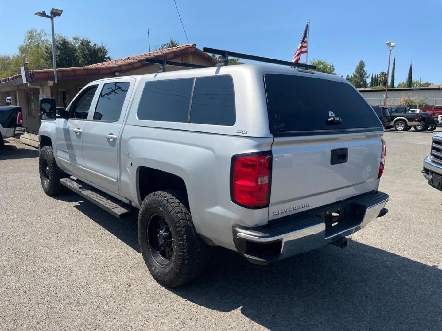 2017 Silver Ice Metallic Chevrolet Silverado 1500 LT (3GCUKREC0HG) with an 5.3L EcoTec3 5.3L V8 355hp 383ft. lbs. Direct Injection engine, 6-Speed Shiftable Automatic w/Overdrive transmission, located at 800 Riverside Ave, Roseville, CA, 95678, 916-773-4549 & Toll Free: 866-719-4393, 38.732265, -121.291039 - 4X4 CREW CAB LT SERVICE RECORDS ON CLEAN CARFAX - Photo#2