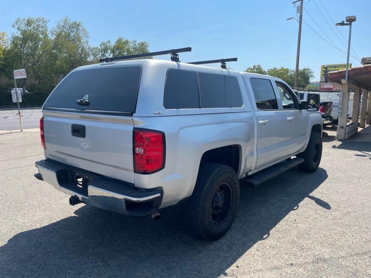 2017 Silver Ice Metallic Chevrolet Silverado 1500 LT (3GCUKREC0HG) with an 5.3L EcoTec3 5.3L V8 355hp 383ft. lbs. Direct Injection engine, 6-Speed Shiftable Automatic w/Overdrive transmission, located at 800 Riverside Ave, Roseville, CA, 95678, 916-773-4549 & Toll Free: 866-719-4393, 38.732265, -121.291039 - 4X4 CREW CAB LT SERVICE RECORDS ON CLEAN CARFAX - Photo#4