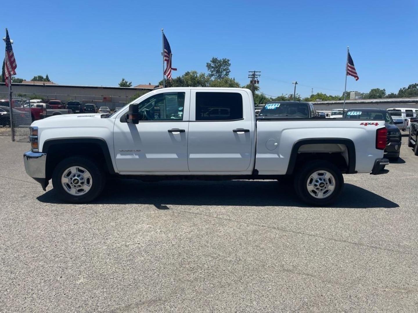 2017 Summit White Chevrolet Silverado 2500HD Work Truck (1GC1KUEYXHF) with an 6.6L Duramax 6.6L Biodiesel Turbo V8 445hp 910ft. lbs. Common Rail Direct Injection engine, Allison 1000 6-Speed Shiftable Automatic transmission, located at 800 Riverside Ave, Roseville, CA, 95678, 916-773-4549 & Toll Free: 866-719-4393, 38.732265, -121.291039 - DURAXAX DIESEL CREW CAB 4X4 ALLISON TRANSMISSION ONE OWNER SERVICE RECORDS ON CLEAN CARFAX - Photo#5