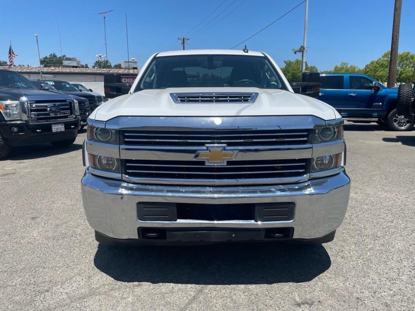 2017 Summit White Chevrolet Silverado 2500HD Work Truck (1GC1KUEYXHF) with an 6.6L Duramax 6.6L Biodiesel Turbo V8 445hp 910ft. lbs. Common Rail Direct Injection engine, Allison 1000 6-Speed Shiftable Automatic transmission, located at 800 Riverside Ave, Roseville, CA, 95678, 916-773-4549 & Toll Free: 866-719-4393, 38.732265, -121.291039 - DURAXAX DIESEL CREW CAB 4X4 ALLISON TRANSMISSION ONE OWNER SERVICE RECORDS ON CLEAN CARFAX - Photo#7