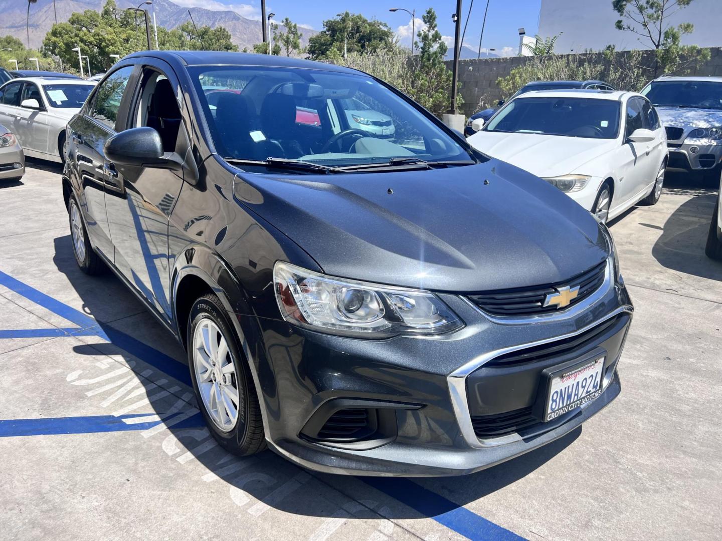 2017 Coliseum Gray /Black Chevrolet Sonic LT Manual Sedan (1G1JD5SHXH4) with an 1.8L L4 DOHC 24V engine, 5M transmission, located at 30 S. Berkeley Avenue, Pasadena, CA, 91107, (626) 248-7567, 34.145447, -118.109398 - 2017 Chevrolet Sonic Sedan – Gray – 130,750 miles – Buy Here Pay Here Pasadena, CA VIN: 1G1JD5SHXH4166595 Looking for an affordable, fuel-efficient sedan that’s easy to own and simple to finance? This 2017 Chevrolet Sonic Sedan in Gray checks all the boxes. It’s a compact, city-frien - Photo#2