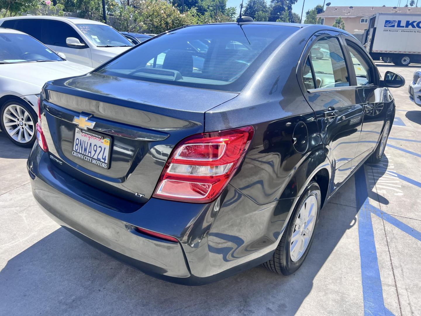 2017 Coliseum Gray /Black Chevrolet Sonic LT Manual Sedan (1G1JD5SHXH4) with an 1.8L L4 DOHC 24V engine, 5M transmission, located at 30 S. Berkeley Avenue, Pasadena, CA, 91107, (626) 248-7567, 34.145447, -118.109398 - 2017 Chevrolet Sonic Sedan – Gray – 130,750 miles – Buy Here Pay Here Pasadena, CA VIN: 1G1JD5SHXH4166595 Looking for an affordable, fuel-efficient sedan that’s easy to own and simple to finance? This 2017 Chevrolet Sonic Sedan in Gray checks all the boxes. It’s a compact, city-frien - Photo#4