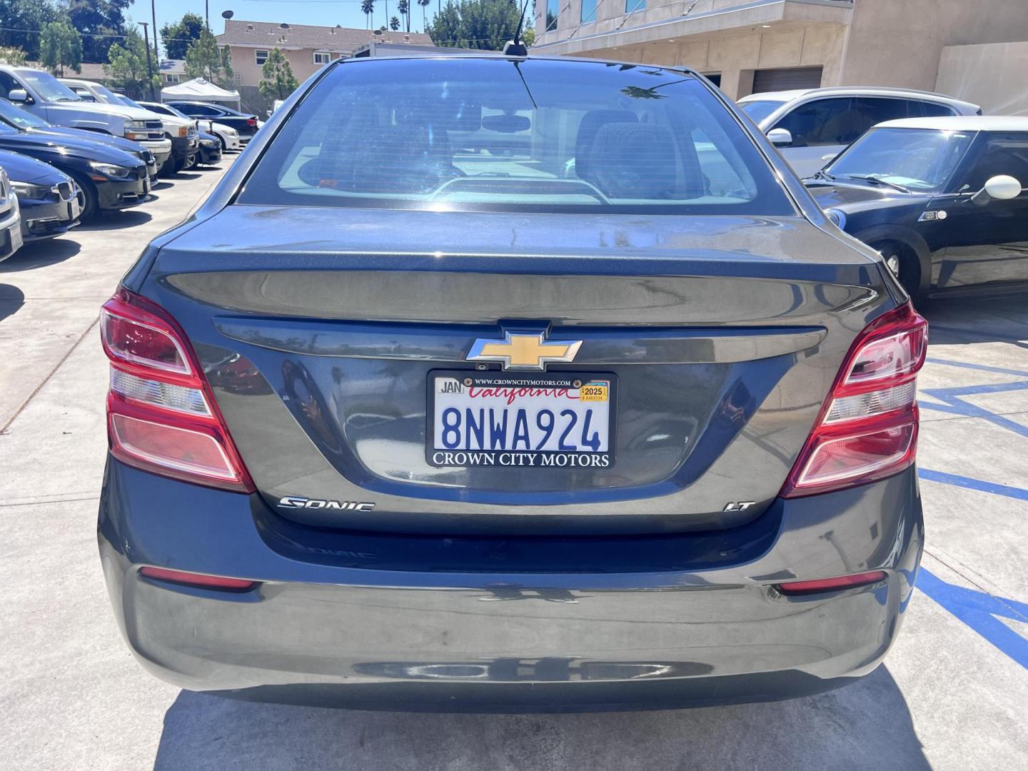2017 Coliseum Gray /Black Chevrolet Sonic LT Manual Sedan (1G1JD5SHXH4) with an 1.8L L4 DOHC 24V engine, 5M transmission, located at 30 S. Berkeley Avenue, Pasadena, CA, 91107, (626) 248-7567, 34.145447, -118.109398 - 2017 Chevrolet Sonic Sedan – Gray – 130,750 miles – Buy Here Pay Here Pasadena, CA VIN: 1G1JD5SHXH4166595 Looking for an affordable, fuel-efficient sedan that’s easy to own and simple to finance? This 2017 Chevrolet Sonic Sedan in Gray checks all the boxes. It’s a compact, city-frien - Photo#5