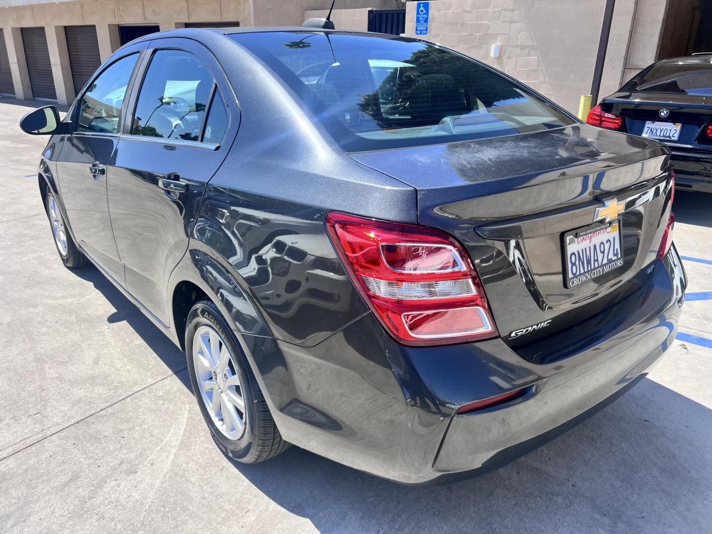 2017 Coliseum Gray /Black Chevrolet Sonic LT Manual Sedan (1G1JD5SHXH4) with an 1.8L L4 DOHC 24V engine, 5M transmission, located at 30 S. Berkeley Avenue, Pasadena, CA, 91107, (626) 248-7567, 34.145447, -118.109398 - 2017 Chevrolet Sonic Sedan – Gray – 130,750 miles – Buy Here Pay Here Pasadena, CA VIN: 1G1JD5SHXH4166595 Looking for an affordable, fuel-efficient sedan that’s easy to own and simple to finance? This 2017 Chevrolet Sonic Sedan in Gray checks all the boxes. It’s a compact, city-frien - Photo#6