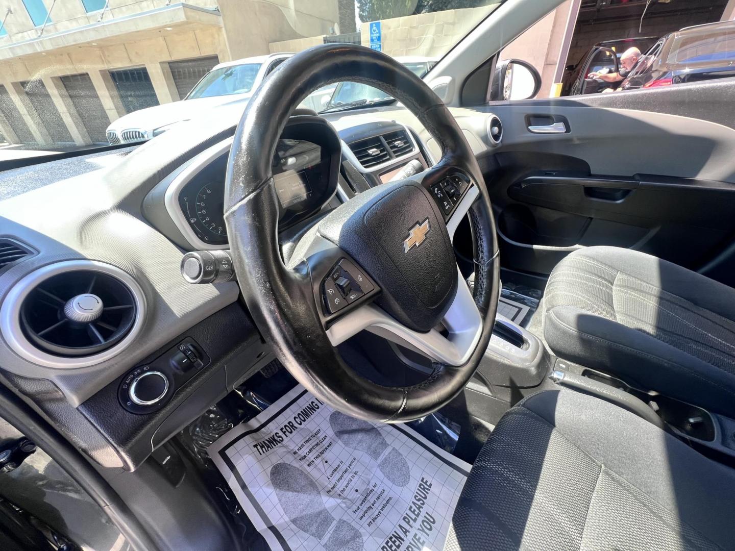2017 Coliseum Gray /Black Chevrolet Sonic LT Manual Sedan (1G1JD5SHXH4) with an 1.8L L4 DOHC 24V engine, 5M transmission, located at 30 S. Berkeley Avenue, Pasadena, CA, 91107, (626) 248-7567, 34.145447, -118.109398 - 2017 Chevrolet Sonic Sedan – Gray – 130,750 miles – Buy Here Pay Here Pasadena, CA VIN: 1G1JD5SHXH4166595 Looking for an affordable, fuel-efficient sedan that’s easy to own and simple to finance? This 2017 Chevrolet Sonic Sedan in Gray checks all the boxes. It’s a compact, city-frien - Photo#8