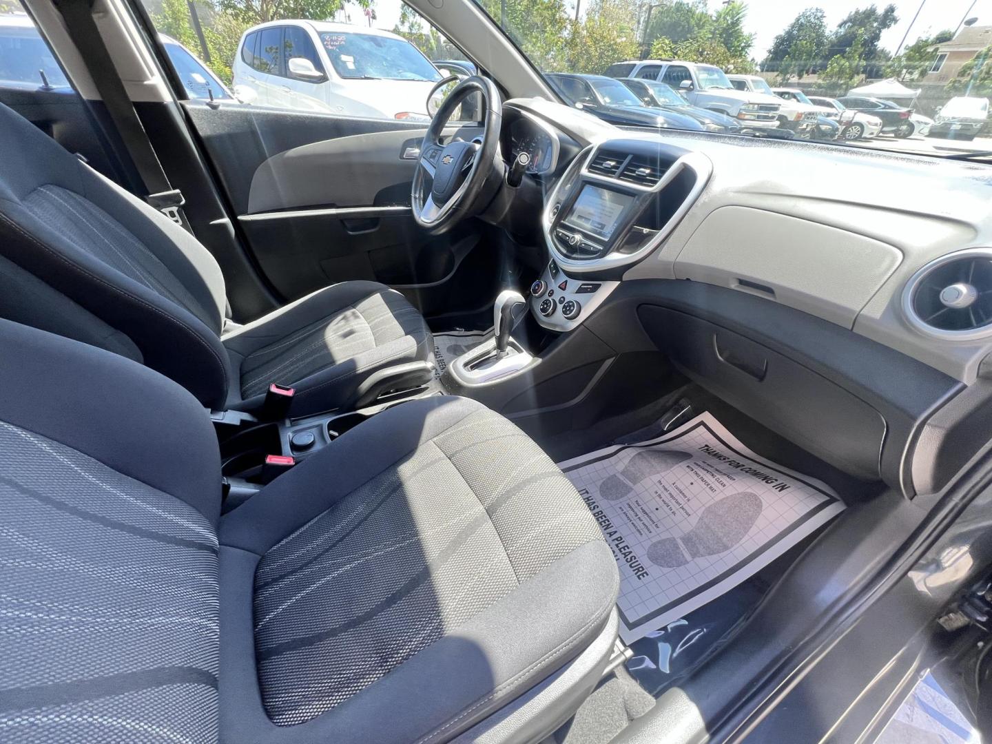 2017 Coliseum Gray /Black Chevrolet Sonic LT Manual Sedan (1G1JD5SHXH4) with an 1.8L L4 DOHC 24V engine, 5M transmission, located at 30 S. Berkeley Avenue, Pasadena, CA, 91107, (626) 248-7567, 34.145447, -118.109398 - 2017 Chevrolet Sonic Sedan – Gray – 130,750 miles – Buy Here Pay Here Pasadena, CA VIN: 1G1JD5SHXH4166595 Looking for an affordable, fuel-efficient sedan that’s easy to own and simple to finance? This 2017 Chevrolet Sonic Sedan in Gray checks all the boxes. It’s a compact, city-frien - Photo#12