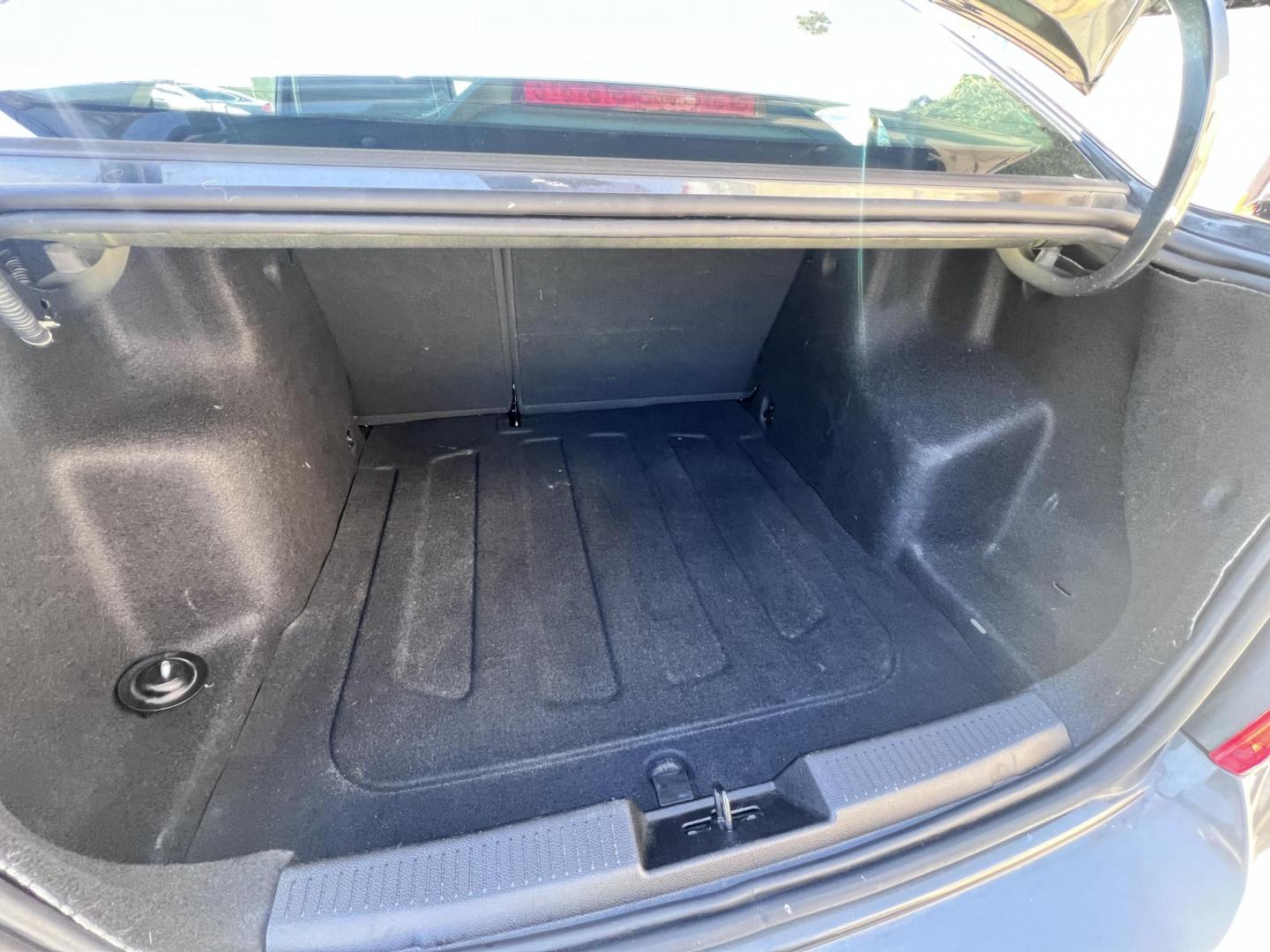 2017 Coliseum Gray /Black Chevrolet Sonic LT Manual Sedan (1G1JD5SHXH4) with an 1.8L L4 DOHC 24V engine, 5M transmission, located at 30 S. Berkeley Avenue, Pasadena, CA, 91107, (626) 248-7567, 34.145447, -118.109398 - 2017 Chevrolet Sonic Sedan – Gray – 130,750 miles – Buy Here Pay Here Pasadena, CA VIN: 1G1JD5SHXH4166595 Looking for an affordable, fuel-efficient sedan that’s easy to own and simple to finance? This 2017 Chevrolet Sonic Sedan in Gray checks all the boxes. It’s a compact, city-frien - Photo#15