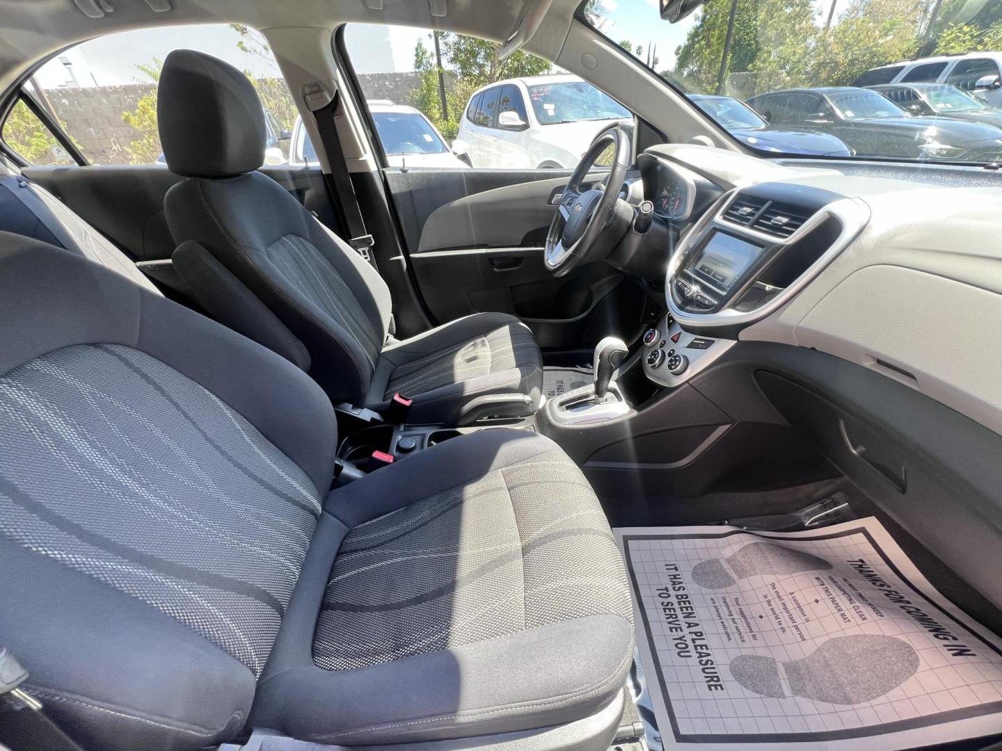 2017 Coliseum Gray /Black Chevrolet Sonic LT Manual Sedan (1G1JD5SHXH4) with an 1.8L L4 DOHC 24V engine, 5M transmission, located at 30 S. Berkeley Avenue, Pasadena, CA, 91107, (626) 248-7567, 34.145447, -118.109398 - 2017 Chevrolet Sonic Sedan – Gray – 130,750 miles – Buy Here Pay Here Pasadena, CA VIN: 1G1JD5SHXH4166595 Looking for an affordable, fuel-efficient sedan that’s easy to own and simple to finance? This 2017 Chevrolet Sonic Sedan in Gray checks all the boxes. It’s a compact, city-frien - Photo#14