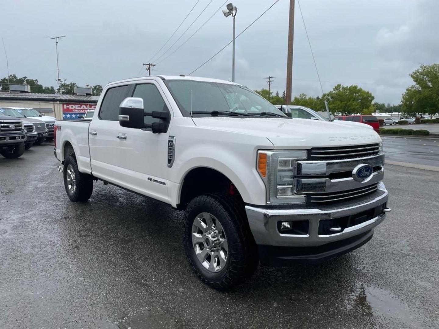 2017 Oxford White Ford F-250 Super Duty Lariat (1FT7W2BT8HE) with an 6.7L Power Stroke 6.7L Biodiesel Turbo V8 440hp 925ft. lbs. Common Rail Direct Injection engine, 6-Speed Shiftable Automatic transmission, located at 800 Riverside Ave, Roseville, CA, 95678, 916-773-4549 & Toll Free: 866-719-4393, 38.732265, -121.291039 - DIESEL CREW CAB 4X4 FX4 LARIAT TWIN PANEL MOON ROOF CLEAN CARFAX - Photo#1