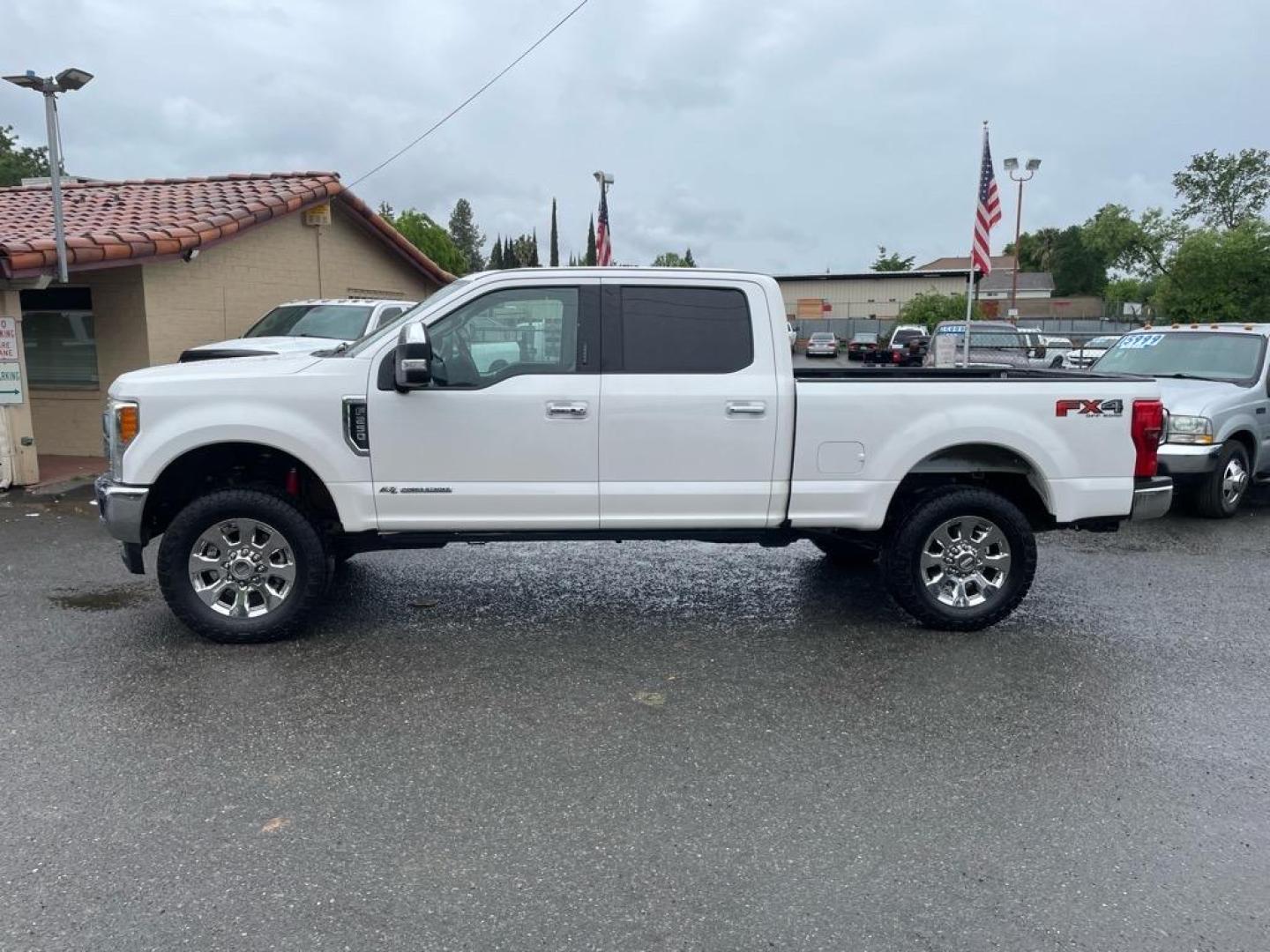 2017 Oxford White Ford F-250 Super Duty Lariat (1FT7W2BT8HE) with an 6.7L Power Stroke 6.7L Biodiesel Turbo V8 440hp 925ft. lbs. Common Rail Direct Injection engine, 6-Speed Shiftable Automatic transmission, located at 800 Riverside Ave, Roseville, CA, 95678, 916-773-4549 & Toll Free: 866-719-4393, 38.732265, -121.291039 - DIESEL CREW CAB 4X4 FX4 LARIAT TWIN PANEL MOON ROOF CLEAN CARFAX - Photo#5