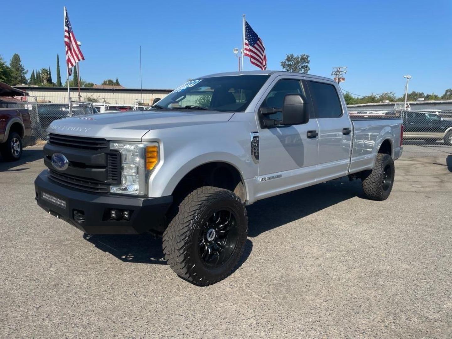 2017 Ingot Silver Ford F-350 Super Duty XL (1FT8W3BT2HE) with an 6.7L Power Stroke 6.7L Biodiesel Turbo V8 440hp 925ft. lbs. Common Rail Direct Injection engine, 6-Speed Shiftable Automatic transmission, located at 800 Riverside Ave, Roseville, CA, 95678, 916-773-4549 & Toll Free: 866-719-4393, 38.732265, -121.291039 - DIESEL CREW CAB 4X4 LIFTED CLEAN CARFAX - Photo#0