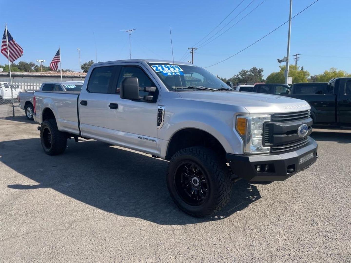 2017 Ingot Silver Ford F-350 Super Duty XL (1FT8W3BT2HE) with an 6.7L Power Stroke 6.7L Biodiesel Turbo V8 440hp 925ft. lbs. Common Rail Direct Injection engine, 6-Speed Shiftable Automatic transmission, located at 800 Riverside Ave, Roseville, CA, 95678, 916-773-4549 & Toll Free: 866-719-4393, 38.732265, -121.291039 - DIESEL CREW CAB 4X4 LIFTED CLEAN CARFAX - Photo#1