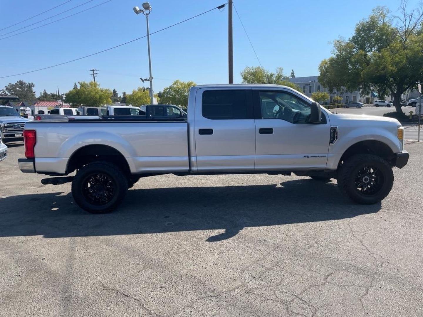 2017 Ingot Silver Ford F-350 Super Duty XL (1FT8W3BT2HE) with an 6.7L Power Stroke 6.7L Biodiesel Turbo V8 440hp 925ft. lbs. Common Rail Direct Injection engine, 6-Speed Shiftable Automatic transmission, located at 800 Riverside Ave, Roseville, CA, 95678, 916-773-4549 & Toll Free: 866-719-4393, 38.732265, -121.291039 - DIESEL CREW CAB 4X4 LIFTED CLEAN CARFAX - Photo#5