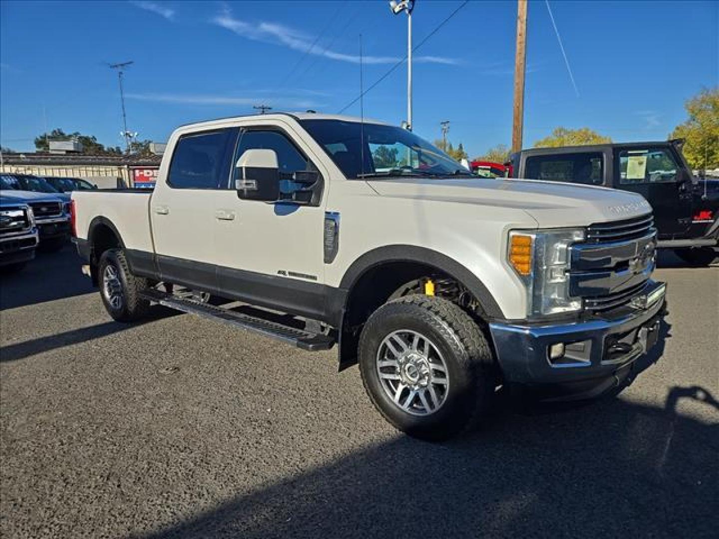 2017 Oxford White Ford F-350 Super Duty Lariat (1FT8W3BT6HE) with an 6.7L Power Stroke 6.7L Biodiesel Turbo V8 440hp 925ft. lbs. Common Rail Direct Injection engine, 6-Speed Shiftable Automatic transmission, located at 800 Riverside Ave, Roseville, CA, 95678, 916-773-4549 & Toll Free: 866-719-4393, 38.732265, -121.291039 - DIESEL CREW CAB 4X4 LARIAT ONE OWNER CLEAN CARFAX - Photo#1