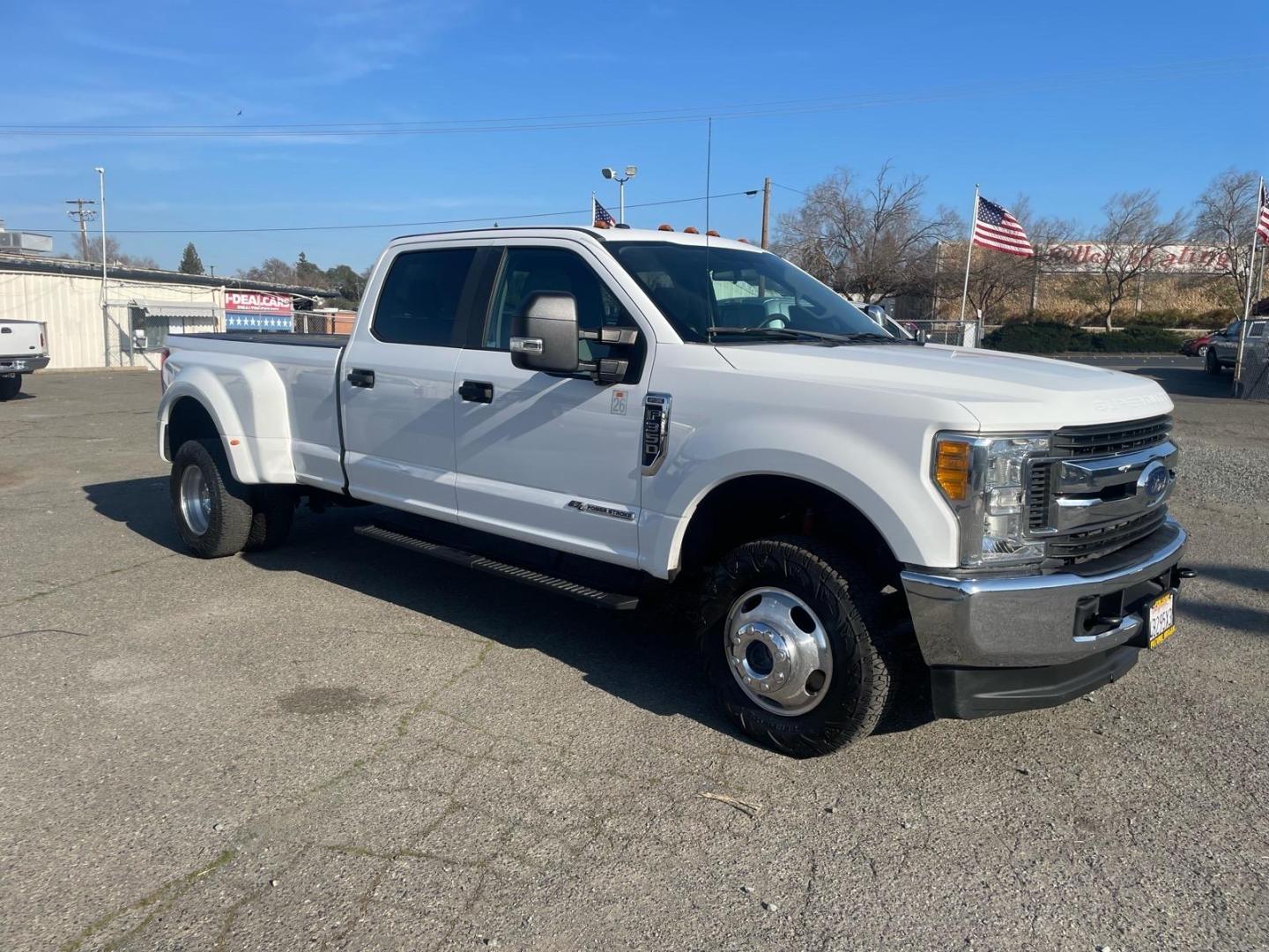 2017 Oxford White Ford F-350 Super Duty XL (1FT8W3DTXHE) with an 6.7L Power Stroke 6.7L Biodiesel Turbo V8 440hp 925ft. lbs. Common Rail Direct Injection engine, 6-Speed Shiftable Automatic transmission, located at 800 Riverside Ave, Roseville, CA, 95678, 916-773-4549 & Toll Free: 866-719-4393, 38.732265, -121.291039 - DIESEL CREW CAB DUALLY 4X4 FX4 CLEAN CARFAX - Photo#1