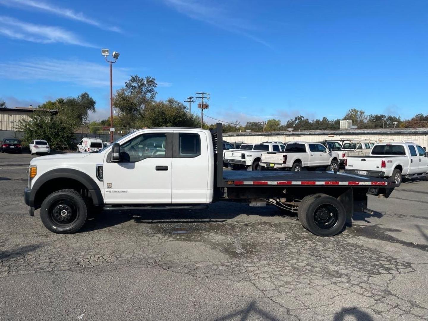 2017 Oxford White Ford F-450 Super Duty XL (1FD0X4HTXHE) with an 6.7L Power Stroke 6.7L Biodiesel Turbo V8 440hp 925ft. lbs. Common Rail Direct Injection engine, 6-Speed Shiftable Automatic transmission, located at 800 Riverside Ave, Roseville, CA, 95678, 916-773-4549 & Toll Free: 866-719-4393, 38.732265, -121.291039 - DIESEL SUPER CAB 4X4 11 FOOT FLAT BED ONE OWNER - Photo#4