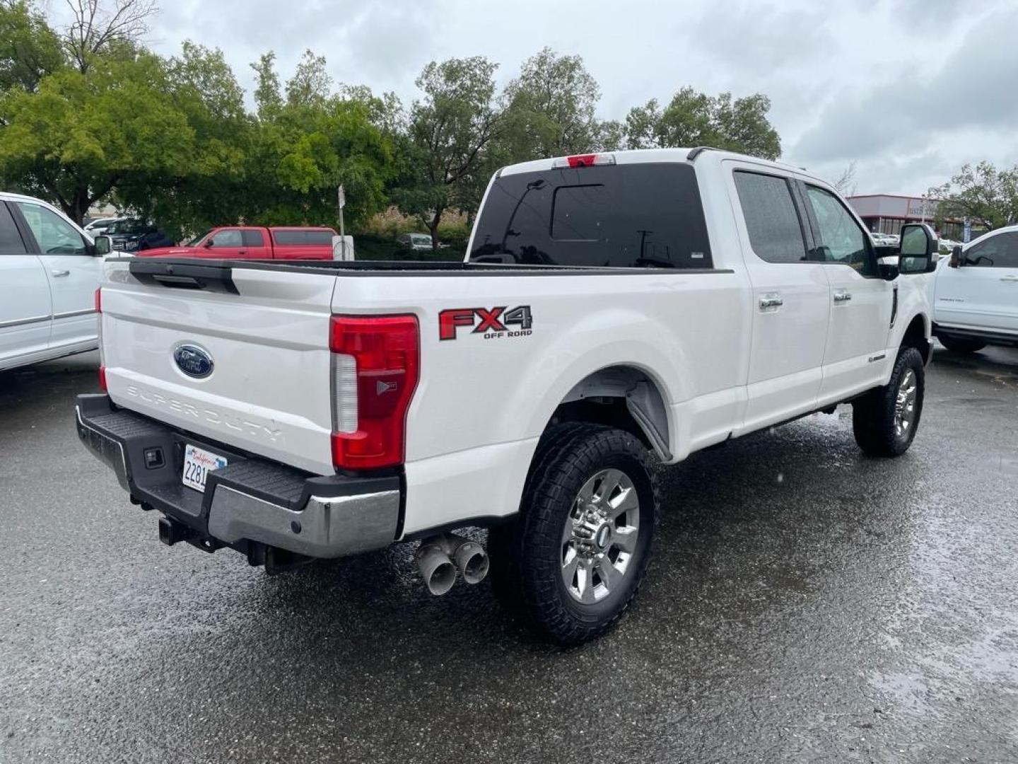 2017 Oxford White Ford F-250 Super Duty Lariat (1FT7W2BT8HE) with an 6.7L Power Stroke 6.7L Biodiesel Turbo V8 440hp 925ft. lbs. Common Rail Direct Injection engine, 6-Speed Shiftable Automatic transmission, located at 800 Riverside Ave, Roseville, CA, 95678, 916-773-4549 & Toll Free: 866-719-4393, 38.732265, -121.291039 - DIESEL CREW CAB 4X4 FX4 LARIAT TWIN PANEL MOON ROOF CLEAN CARFAX - Photo#4