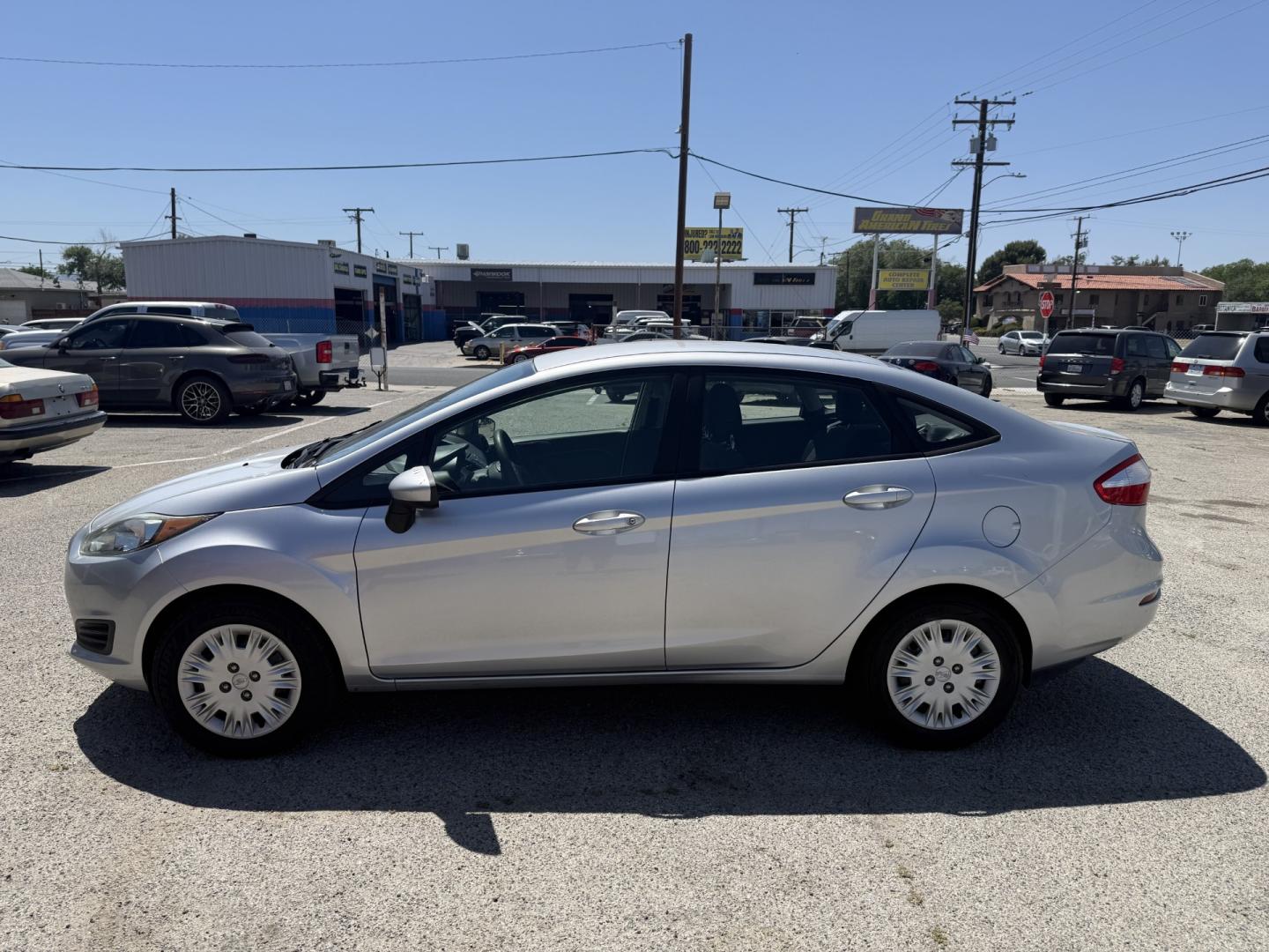 2017 Ford Fiesta S Sedan (3FADP4AJ3HM) with an 1.6L L4 DOHC 16V engine, MANUAL transmission, located at 44356 Date Ave., Lancaster, CA, 93534, (661) 945-6555, 34.688919, -118.139374 - Photo#2