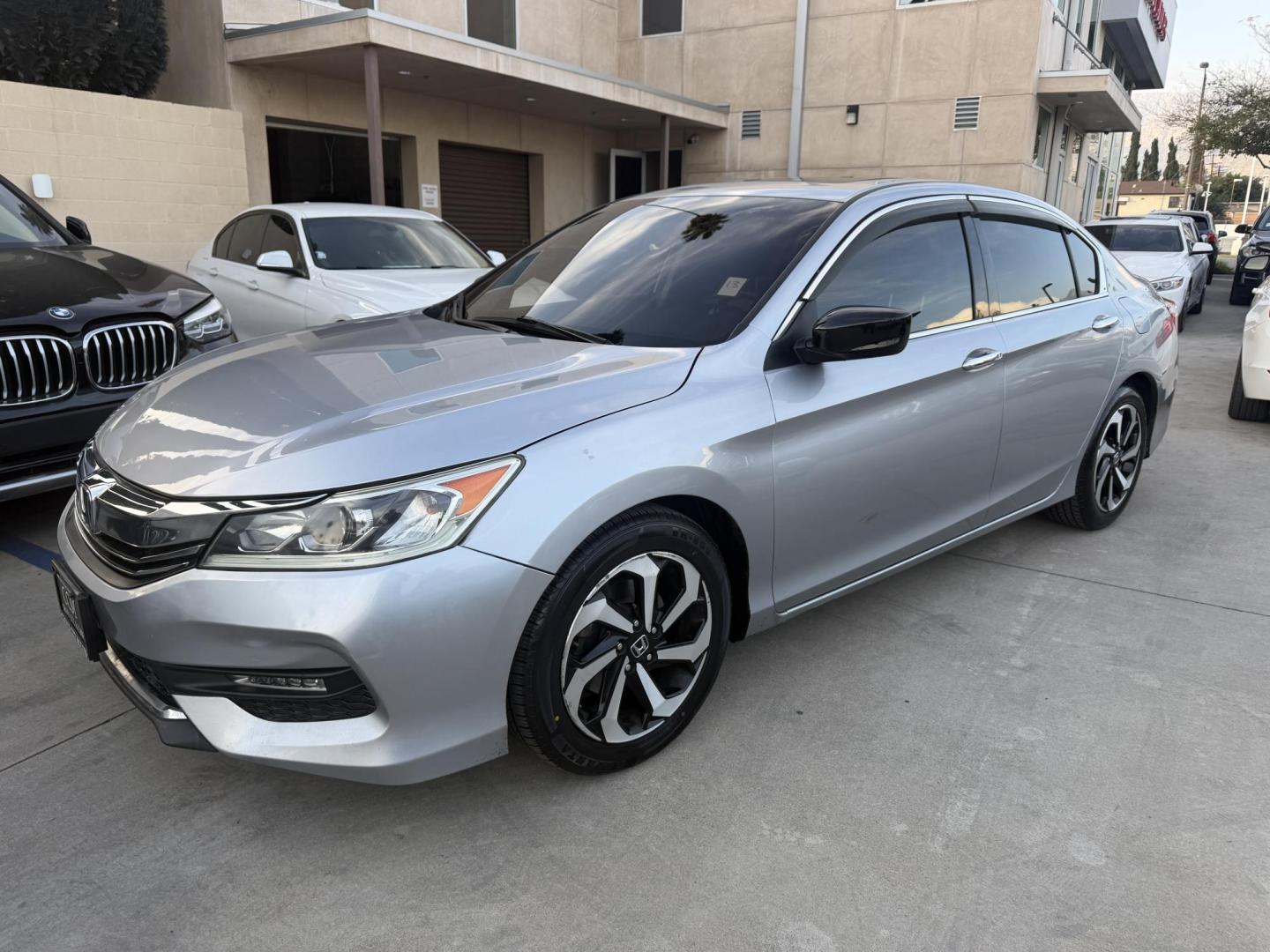 2017 Silver /Gray Honda Accord EX-L Sedan V6 6-Spd AT (1HGCR3F86HA) with an 3.5L V6 SOHC 24V engine, 6A transmission, located at 30 S. Berkeley Avenue, Pasadena, CA, 91107, (626) 248-7567, 34.145447, -118.109398 - Navigation! Leather Seats! Moon-roof! This 2017 Honda Accord EX-L Sedan V6 6-Spd AT looks and drives good. - Photo#0