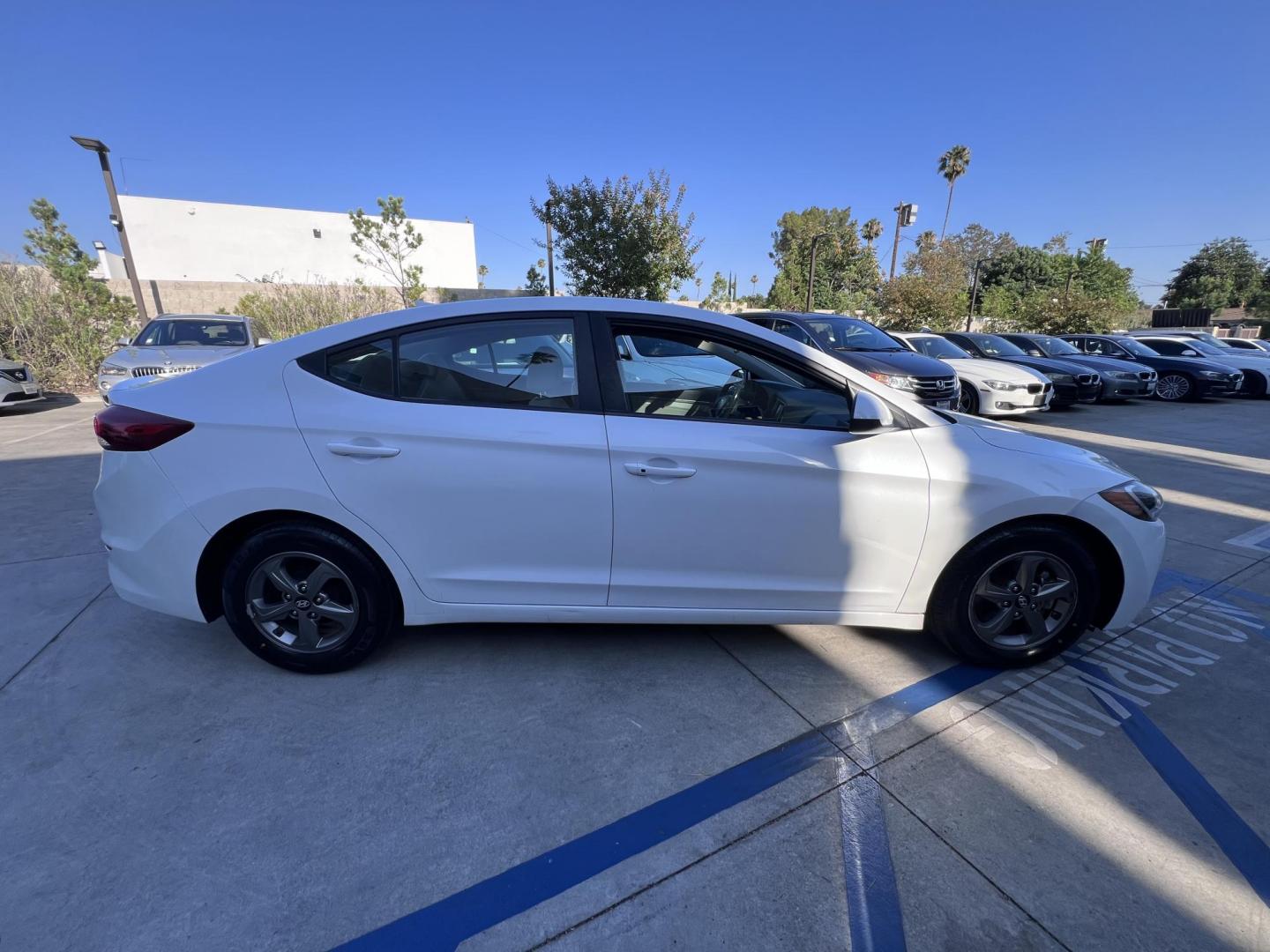 2017 White /Gray Hyundai Elantra Eco (5NPD94LA1HH) with an 1.4L LE DOCH 16V TURBO engine, 7A transmission, located at 30 S. Berkeley Avenue, Pasadena, CA, 91107, (626) 248-7567, 34.145447, -118.109398 - Crown City Motors is a used “Buy Here Pay Here” car dealer in Pasadena CA. “Buy Here Pay Here” financing, means that when you purchase your vehicle from our dealership, that you make the payments to the dealership as well. We do not need the banks approval to get you approved for a used auto - Photo#3