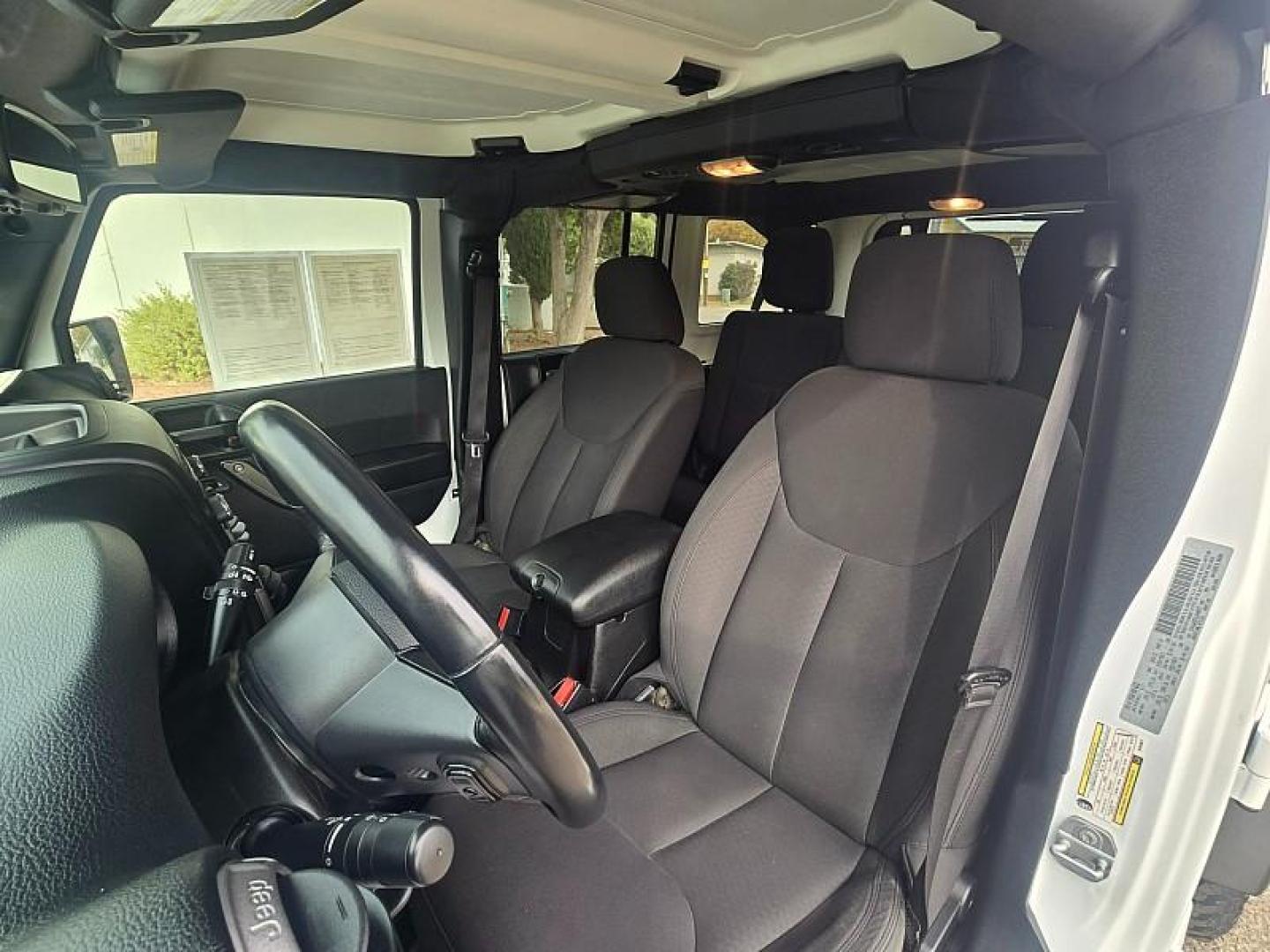 2017 WHITE Jeep Wrangler Unlimited (1C4HJWDG5HL) with an V6 3.6 Liter engine, Automatic 5-Spd transmission, located at 246 E Walker St., Orland, 95963, (530) 865-5800, 39.747589, -122.178398 - Photo#9