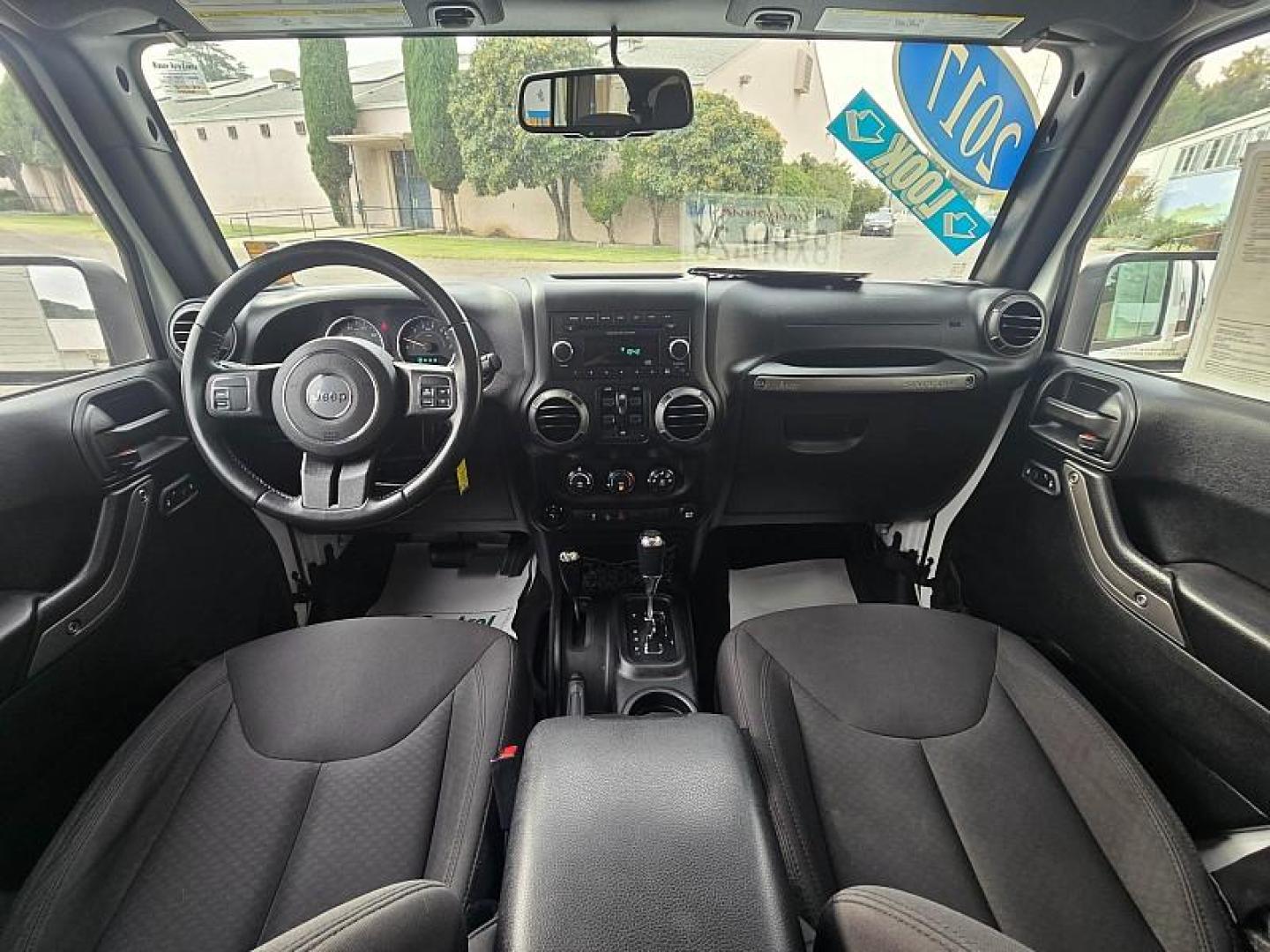2017 WHITE Jeep Wrangler Unlimited (1C4HJWDG5HL) with an V6 3.6 Liter engine, Automatic 5-Spd transmission, located at 246 E Walker St., Orland, 95963, (530) 865-5800, 39.747589, -122.178398 - Photo#19