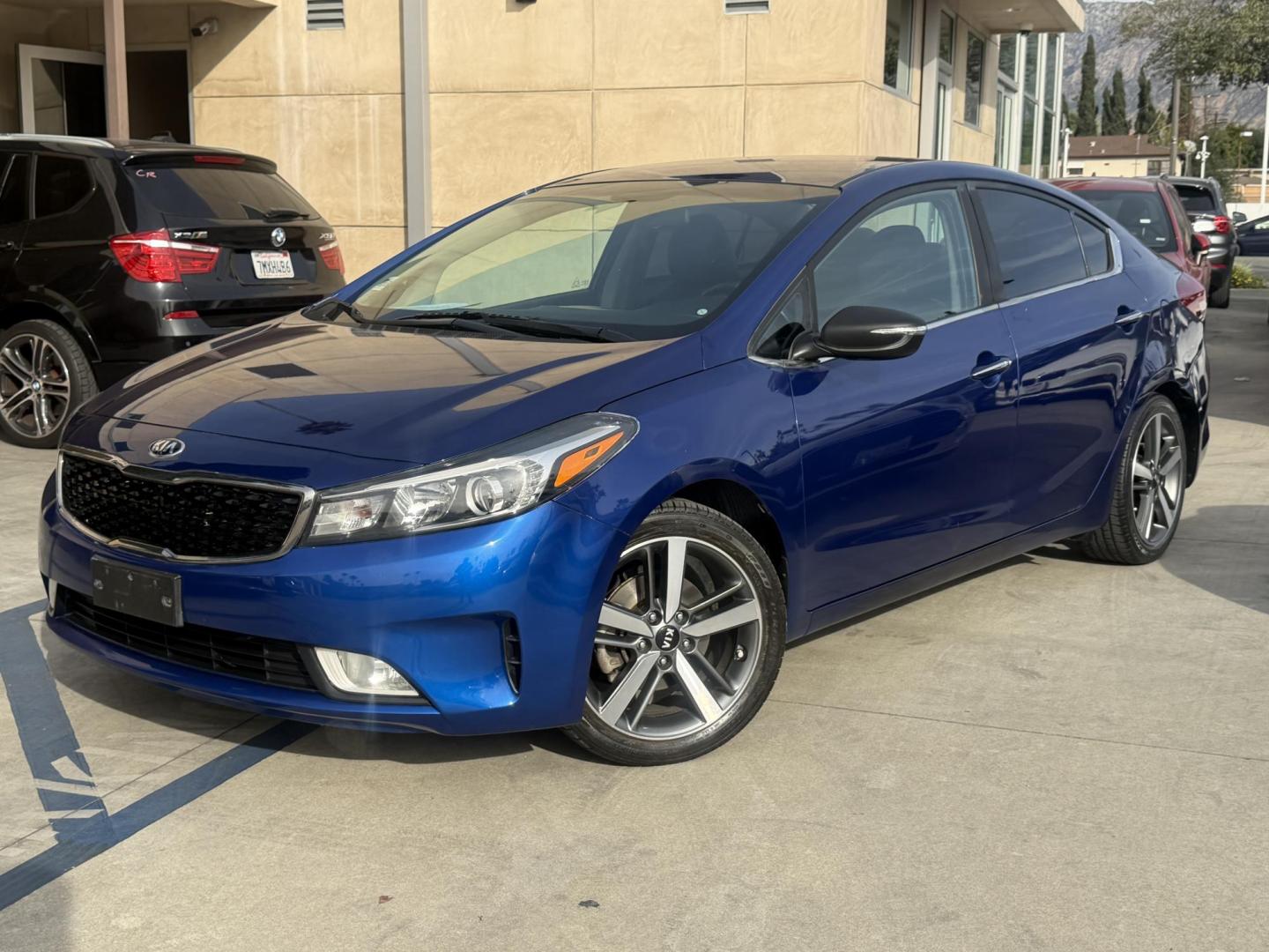 2017 Kia Forte EX (3KPFL4A80HE) with an 2.0L L4 DOHC 16V engine, 6A transmission, located at 30 S. Berkeley Avenue, Pasadena, CA, 91107, (626) 248-7567, 34.145447, -118.109398 - Crown City Motors is a used “Buy Here Pay Here” car dealer in Pasadena CA. “Buy Here Pay Here” financing, means that when you purchase your vehicle from our dealership, that you make the payments to the dealership as well. We do not need the banks approval to get you approved for a used auto - Photo#0