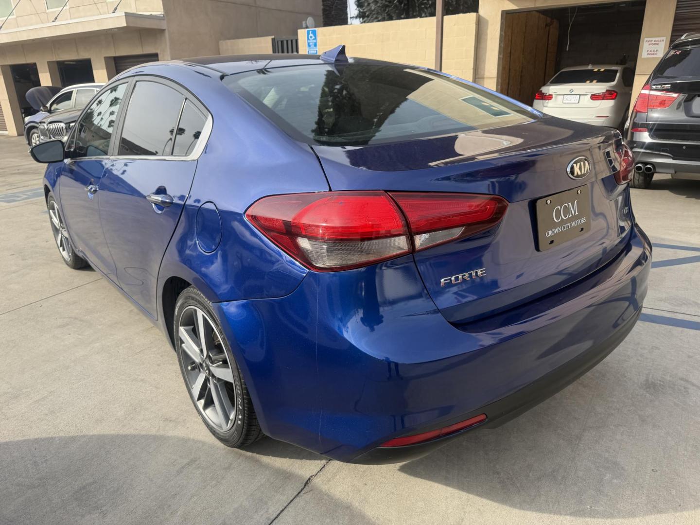 2017 Kia Forte EX (3KPFL4A80HE) with an 2.0L L4 DOHC 16V engine, 6A transmission, located at 30 S. Berkeley Avenue, Pasadena, CA, 91107, (626) 248-7567, 34.145447, -118.109398 - Crown City Motors is a used “Buy Here Pay Here” car dealer in Pasadena CA. “Buy Here Pay Here” financing, means that when you purchase your vehicle from our dealership, that you make the payments to the dealership as well. We do not need the banks approval to get you approved for a used auto - Photo#2