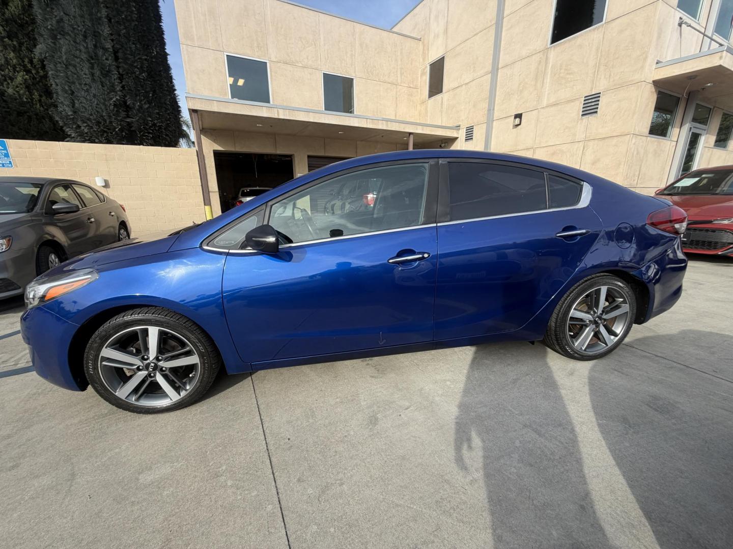 2017 Kia Forte EX (3KPFL4A80HE) with an 2.0L L4 DOHC 16V engine, 6A transmission, located at 30 S. Berkeley Avenue, Pasadena, CA, 91107, (626) 248-7567, 34.145447, -118.109398 - Crown City Motors is a used “Buy Here Pay Here” car dealer in Pasadena CA. “Buy Here Pay Here” financing, means that when you purchase your vehicle from our dealership, that you make the payments to the dealership as well. We do not need the banks approval to get you approved for a used auto - Photo#1