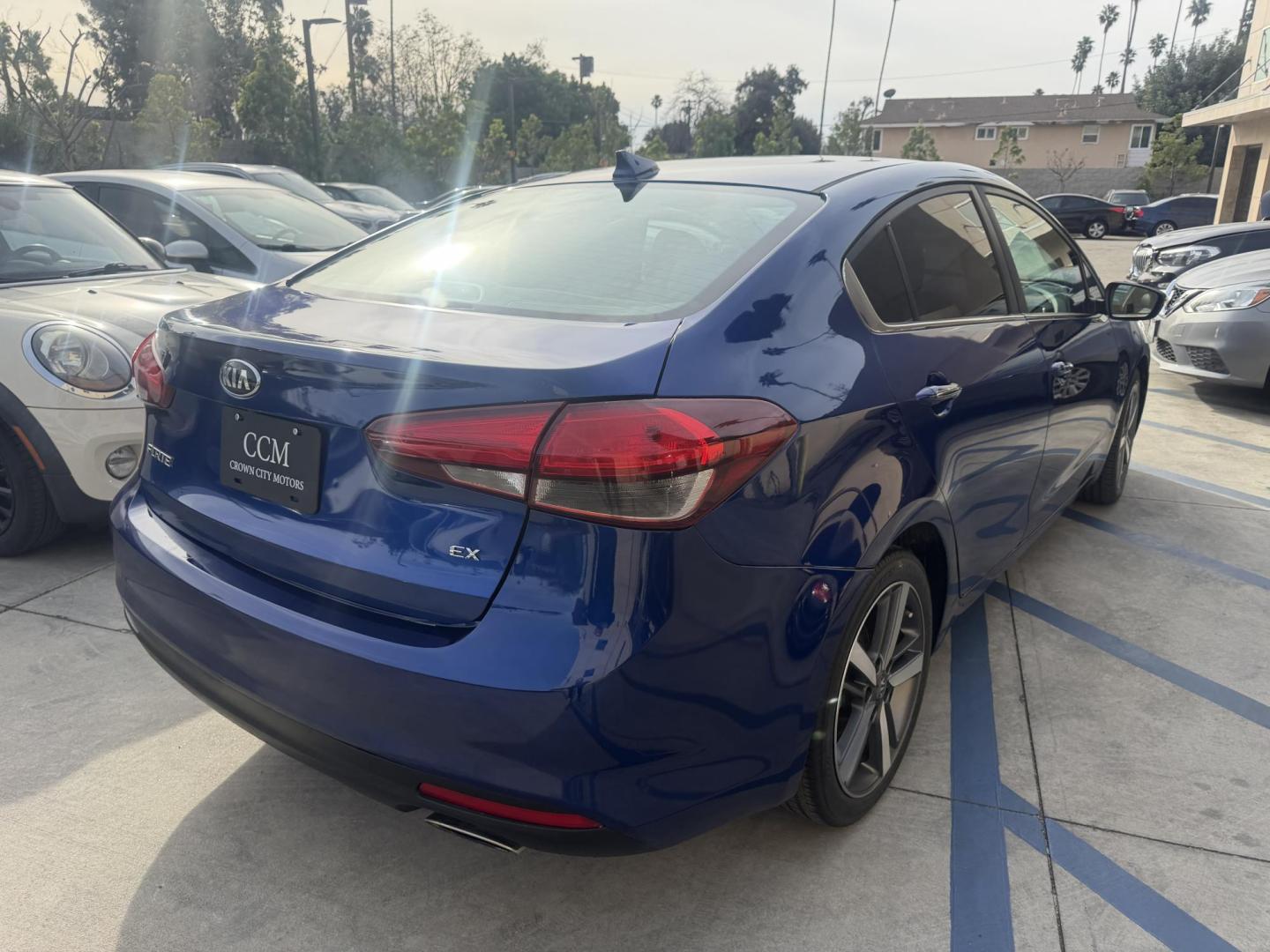 2017 Kia Forte EX (3KPFL4A80HE) with an 2.0L L4 DOHC 16V engine, 6A transmission, located at 30 S. Berkeley Avenue, Pasadena, CA, 91107, (626) 248-7567, 34.145447, -118.109398 - Crown City Motors is a used “Buy Here Pay Here” car dealer in Pasadena CA. “Buy Here Pay Here” financing, means that when you purchase your vehicle from our dealership, that you make the payments to the dealership as well. We do not need the banks approval to get you approved for a used auto - Photo#4