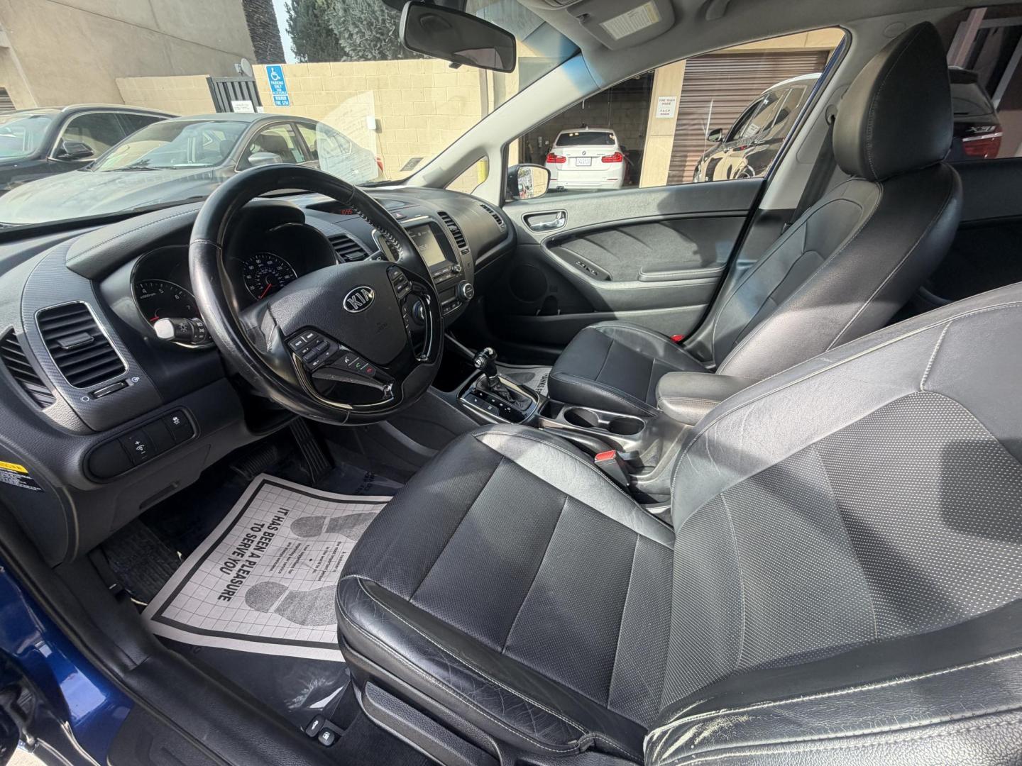 2017 Kia Forte EX (3KPFL4A80HE) with an 2.0L L4 DOHC 16V engine, 6A transmission, located at 30 S. Berkeley Avenue, Pasadena, CA, 91107, (626) 248-7567, 34.145447, -118.109398 - Crown City Motors is a used “Buy Here Pay Here” car dealer in Pasadena CA. “Buy Here Pay Here” financing, means that when you purchase your vehicle from our dealership, that you make the payments to the dealership as well. We do not need the banks approval to get you approved for a used auto - Photo#6