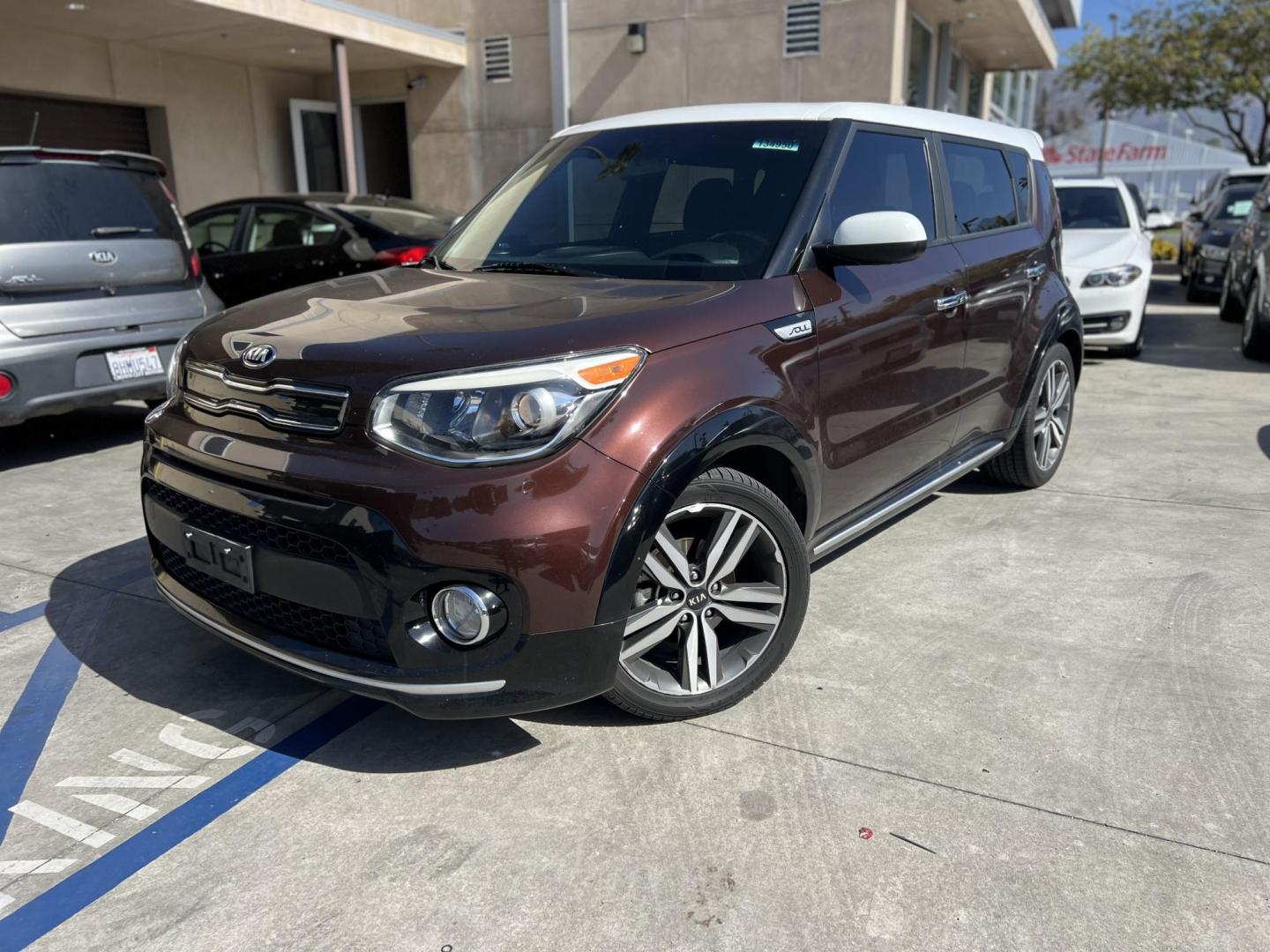 2017 Burnished Copper /Black Kia Soul + (KNDJP3A55H7) with an 2.0L L4 DOHC 16V engine, 6A transmission, located at 30 S. Berkeley Avenue, Pasadena, CA, 91107, (626) 248-7567, 34.145447, -118.109398 - 2017 Kia Soul – Two-Tone Style, Technology, and Affordable Financing – Buy Here Pay Here in Pasadena, CA Looking for a vehicle that blends stand-out design, tech features, and budget-friendly reliability? This 2017 Kia Soul is the perfect compact crossover — and it's available now at Crown - Photo#0