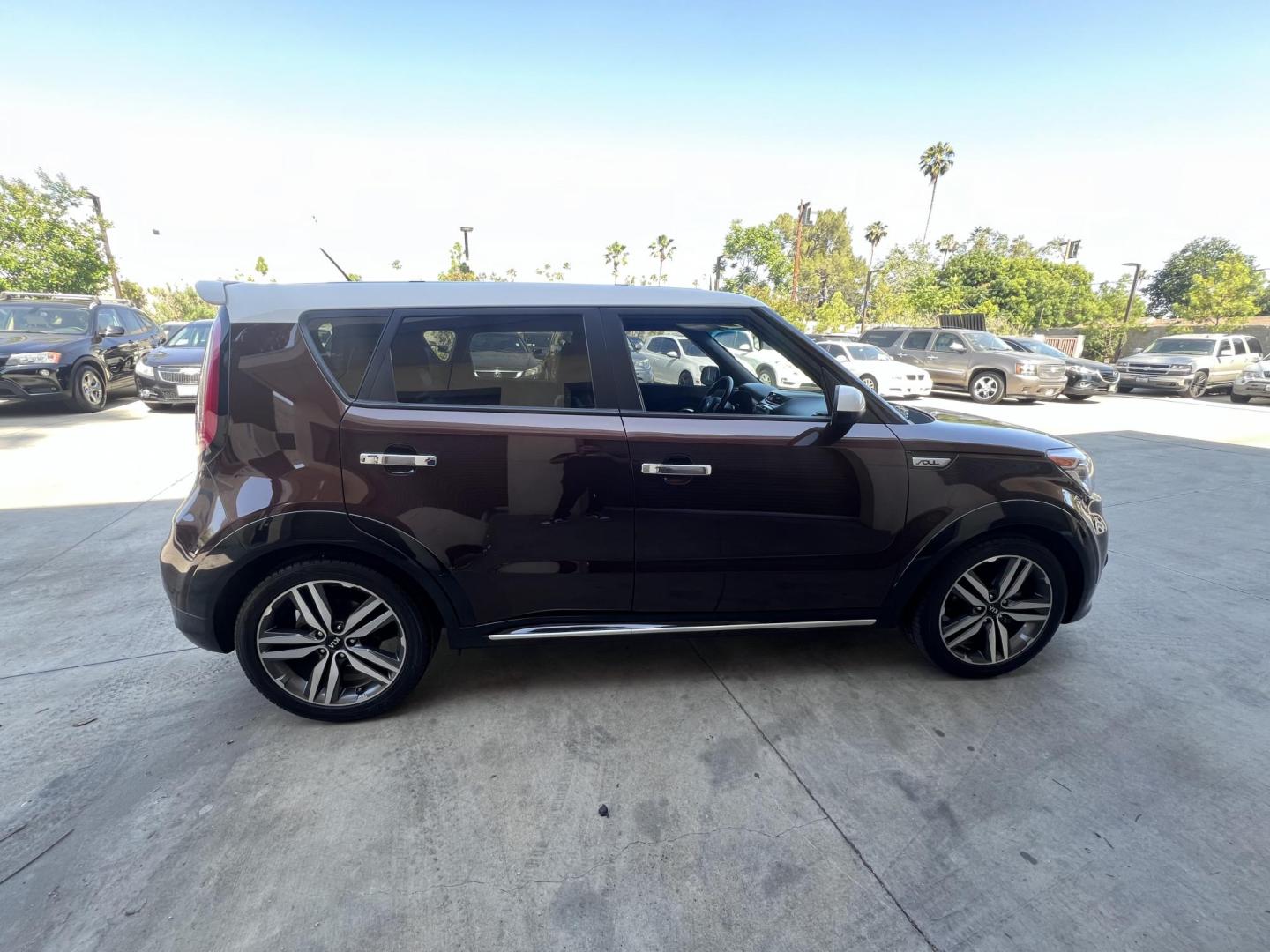 2017 Burnished Copper /Black Kia Soul + (KNDJP3A55H7) with an 2.0L L4 DOHC 16V engine, 6A transmission, located at 30 S. Berkeley Avenue, Pasadena, CA, 91107, (626) 248-7567, 34.145447, -118.109398 - 2017 Kia Soul – Two-Tone Style, Technology, and Affordable Financing – Buy Here Pay Here in Pasadena, CA Looking for a vehicle that blends stand-out design, tech features, and budget-friendly reliability? This 2017 Kia Soul is the perfect compact crossover — and it's available now at Crown - Photo#12